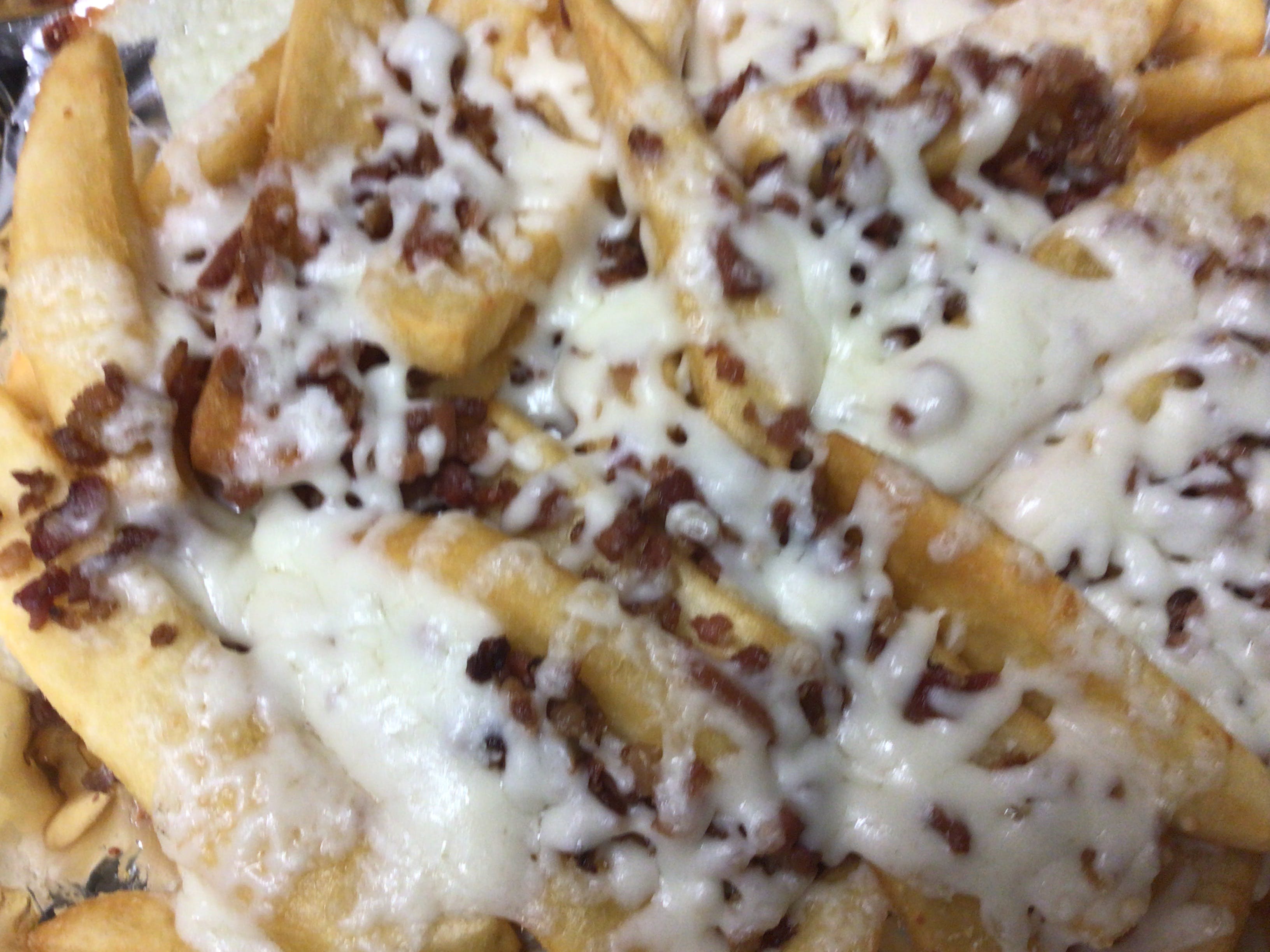 Order French Fries with Cheese & Bacon - Appetizers food online from Porto Fino Pizza store, Columbus on bringmethat.com