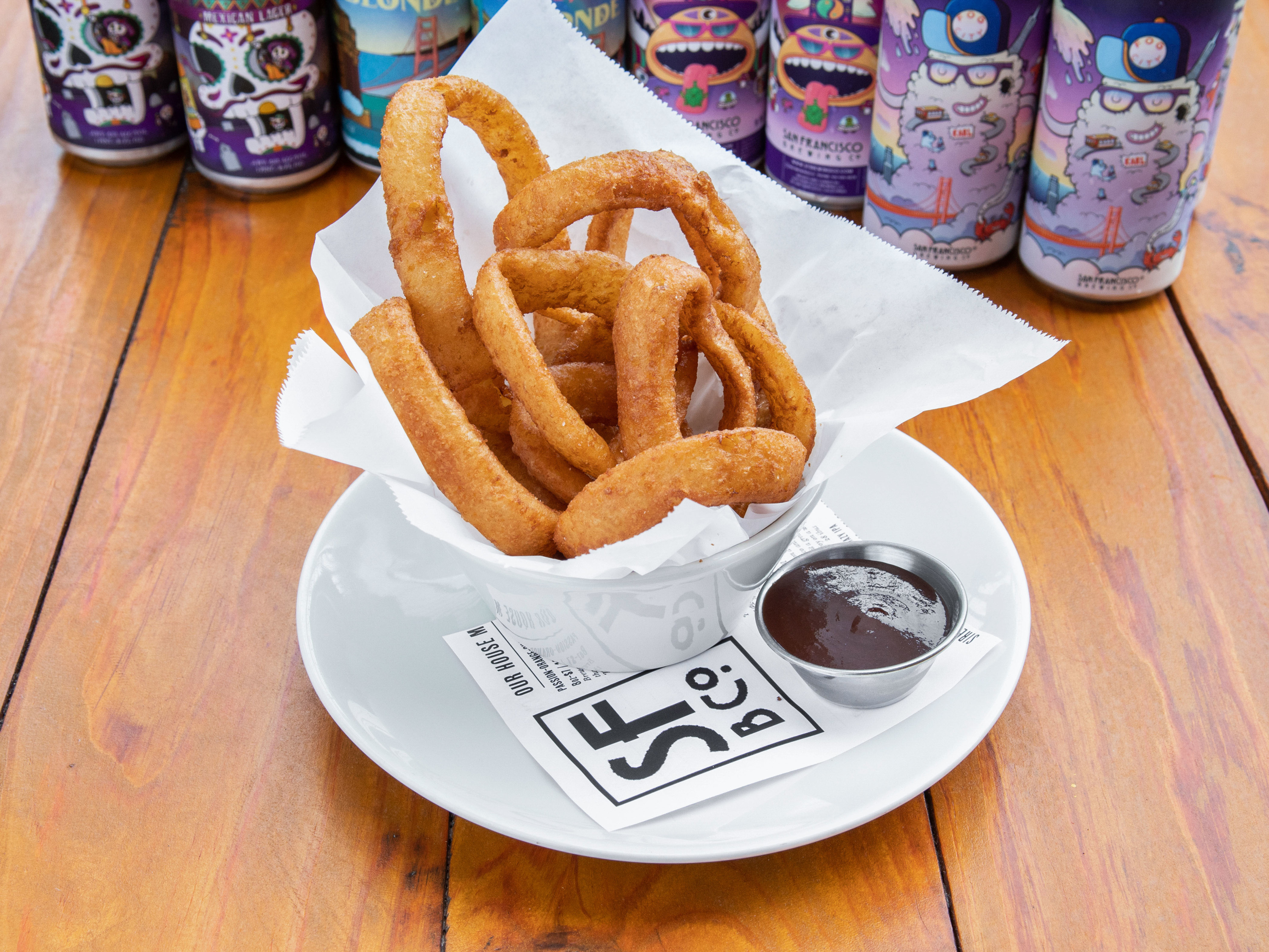 Order Beer Battered Onion Rings food online from San Francisco Brewing Co store, San Francisco on bringmethat.com