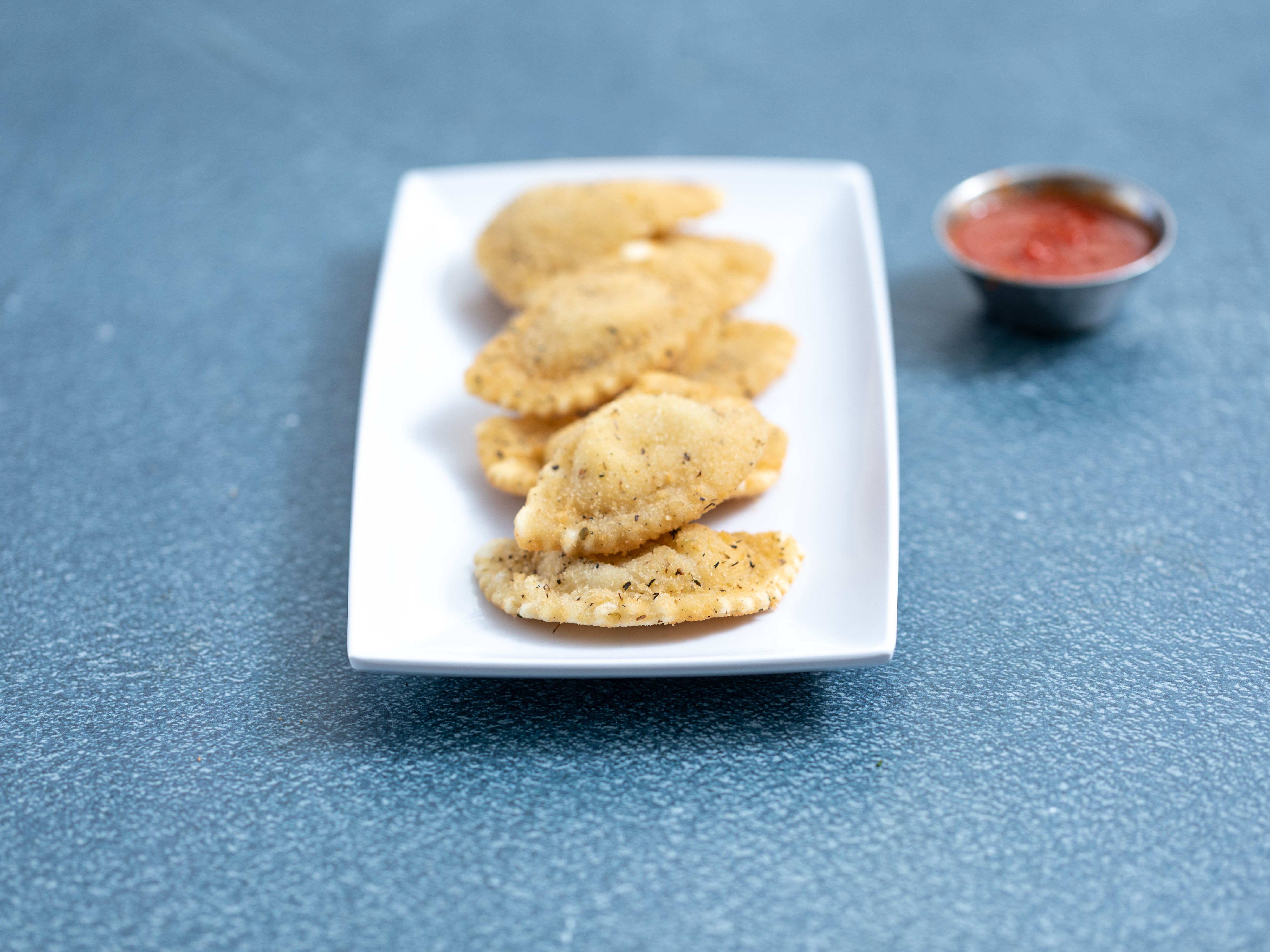 Order Toasted Ravioli food online from Fiorella Express store, Belmont on bringmethat.com