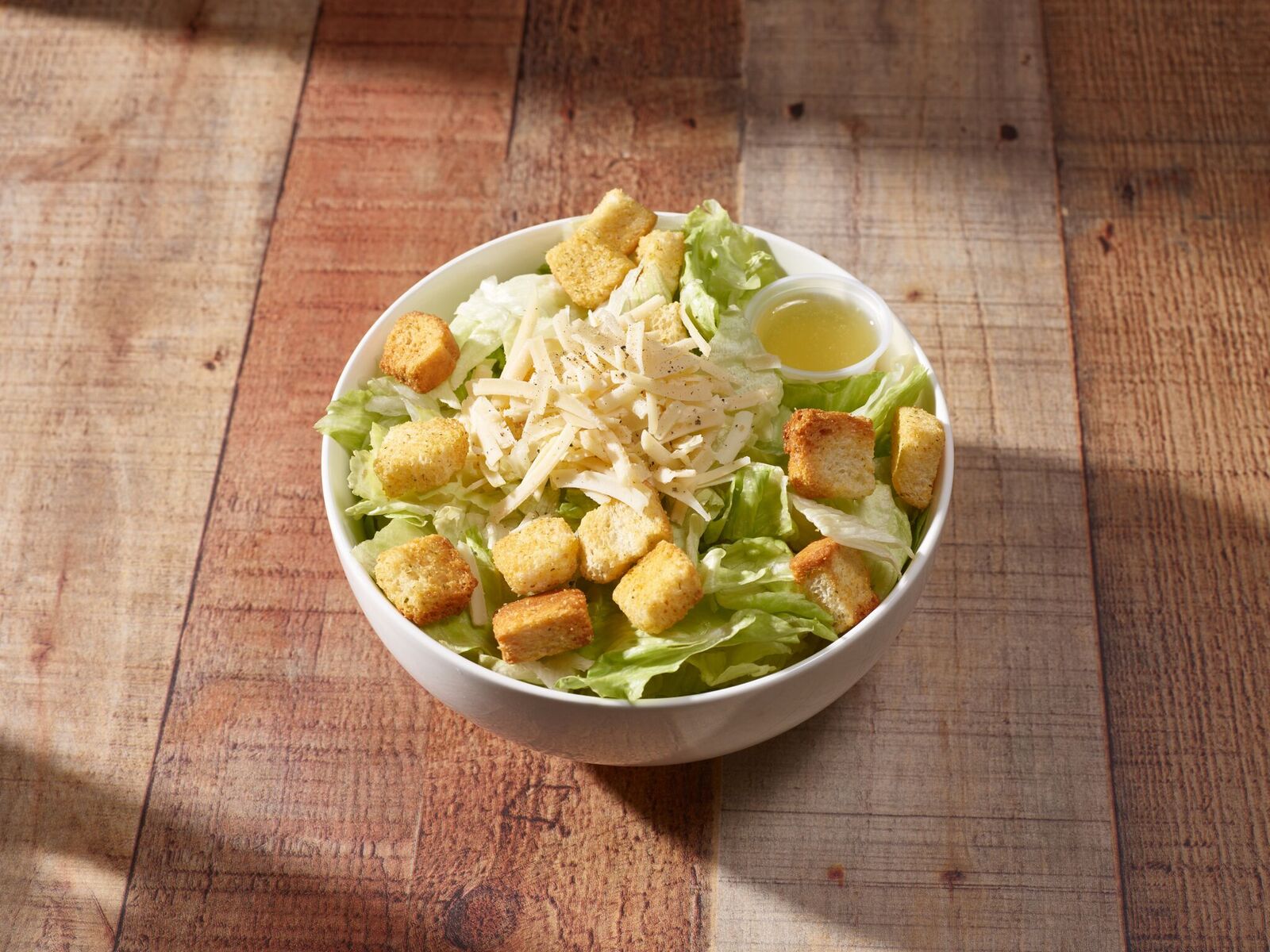 Order Caesar Salad food online from Wildcat Pizza Pub store, Camillus on bringmethat.com