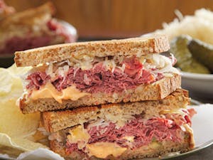 Order Grilled Reuben Sandwich (1040 cal) food online from Leo Coney Island store, Shelby Charter Township on bringmethat.com