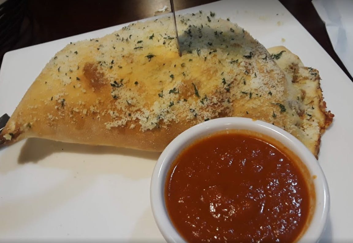 Order Calzone - Calzone food online from Italian Garden Dining store, Mountain Home on bringmethat.com