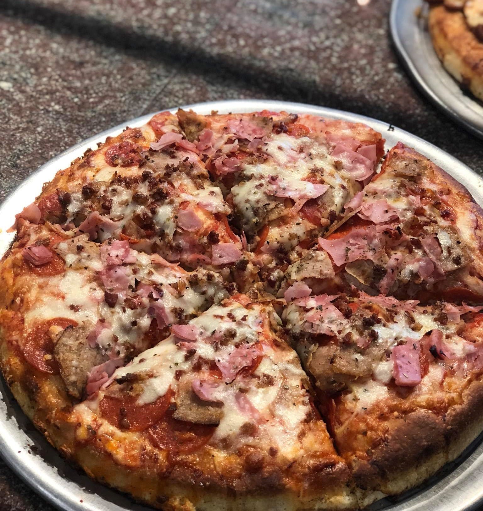 Order Meat Lover's Pizza - Medium 14'' food online from Padrino's Pizza & Family store, Eagleville on bringmethat.com