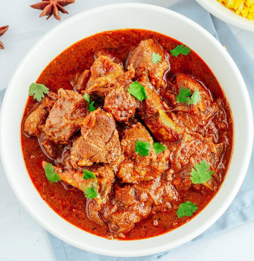Order Beef Vindaloo (+ Free Dessert) food online from Spices Of India Kitchen store, Irving on bringmethat.com