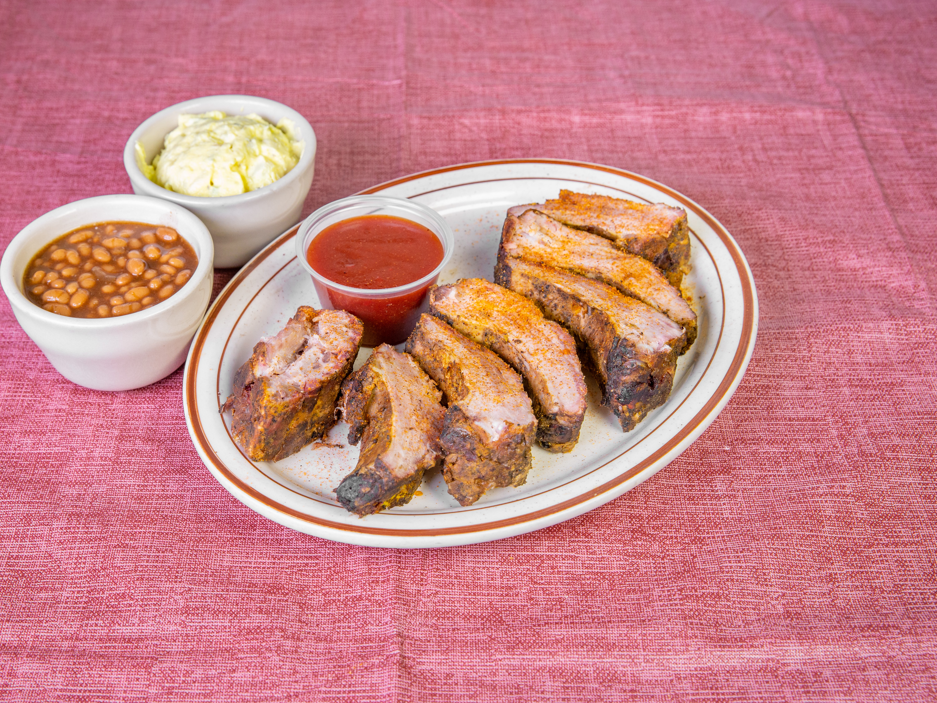 Order 1/2 Slab of Kelly’s BBQ Ribs food online from Kelly Q & Whipper Dairy store, Walton on bringmethat.com