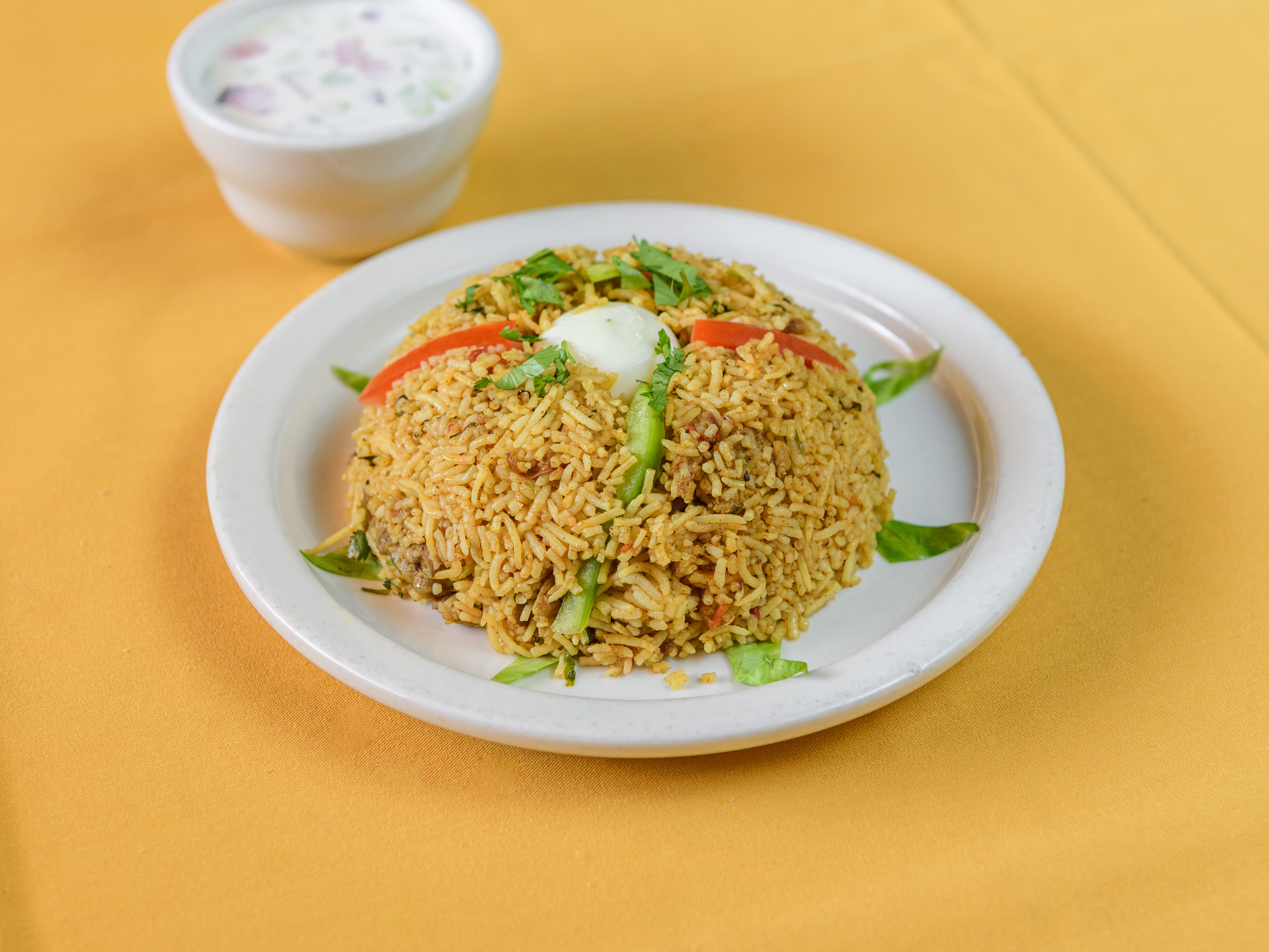 Order Chicken Biriyani food online from Taj Cuisine of India store, Oklahoma City on bringmethat.com