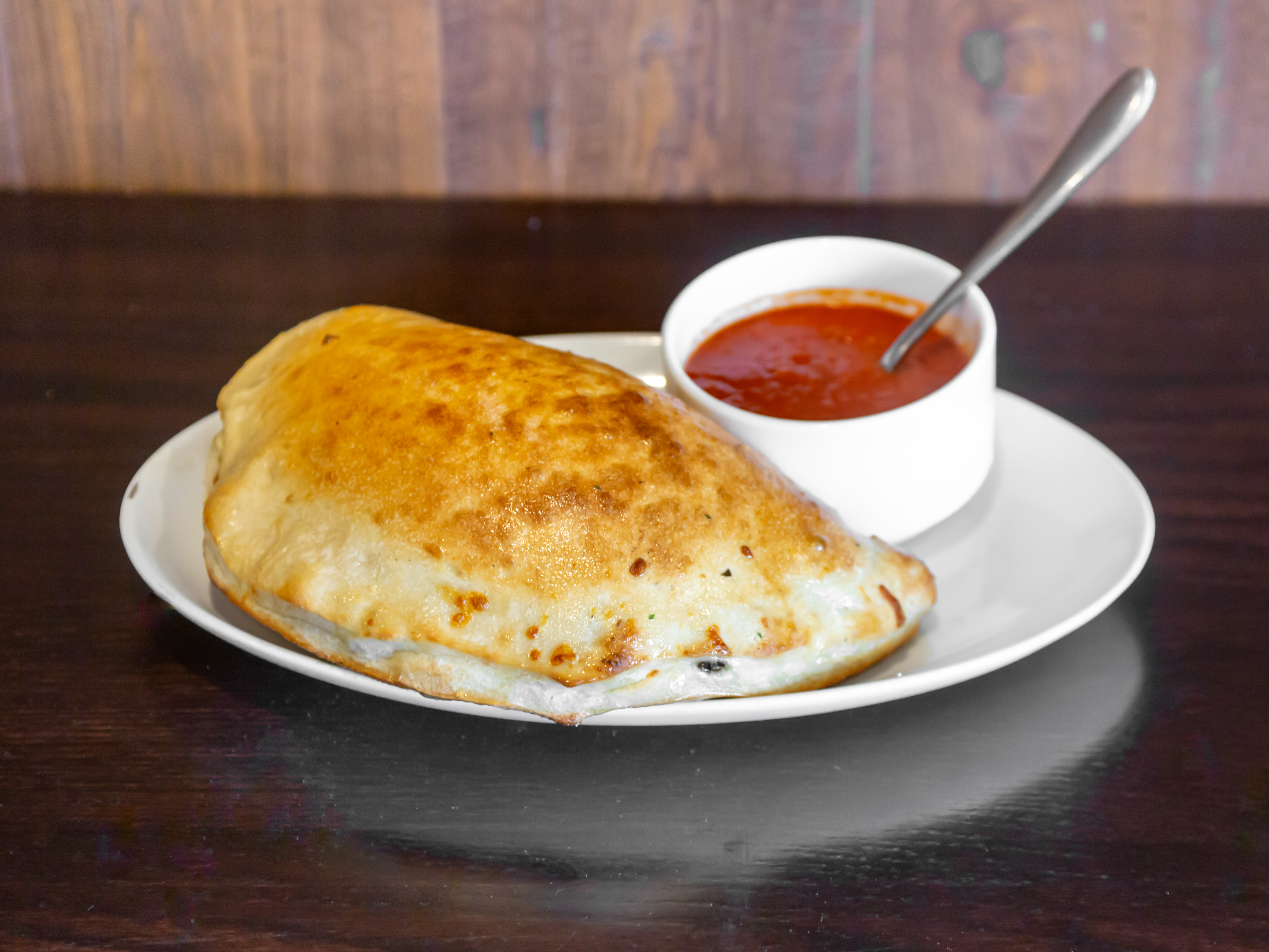 Order Cheese Calzone Special food online from Illiano Pizzeria & Restaurant store, Colchester on bringmethat.com