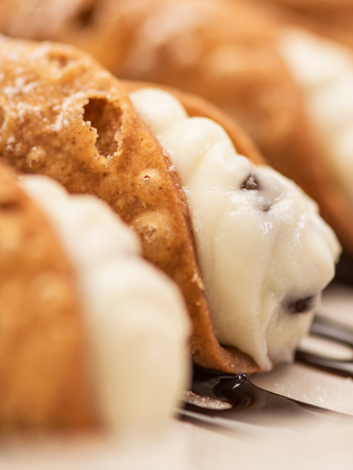 Order Chocolate Chip Cannoli - Dessert food online from Buca di Beppo store, Franklin on bringmethat.com