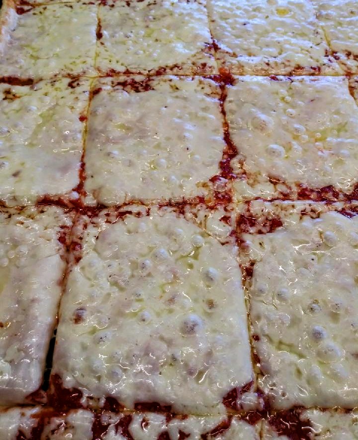 Order Tray of 20 Extra Cheese Pizza Slices food online from Tripoli Pizza & Bakery - North Andover store, North Andover on bringmethat.com