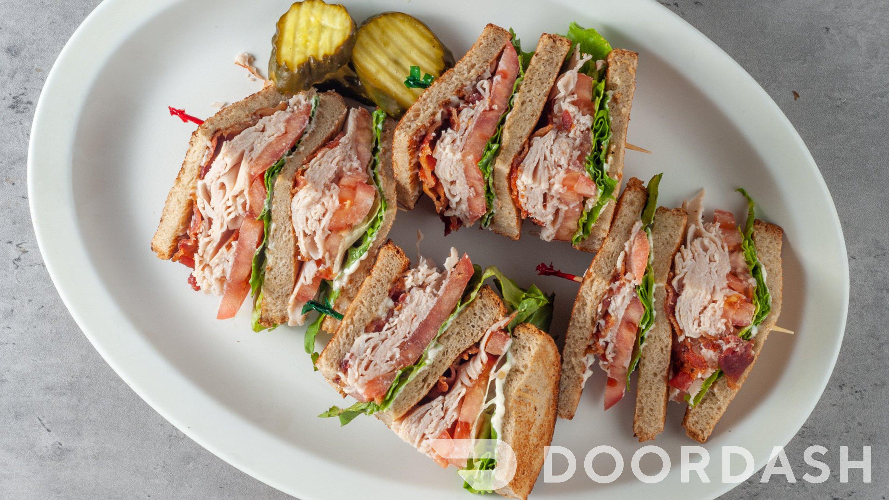 Order Turkey Club food online from Our Deli & Cafe store, Paoli on bringmethat.com
