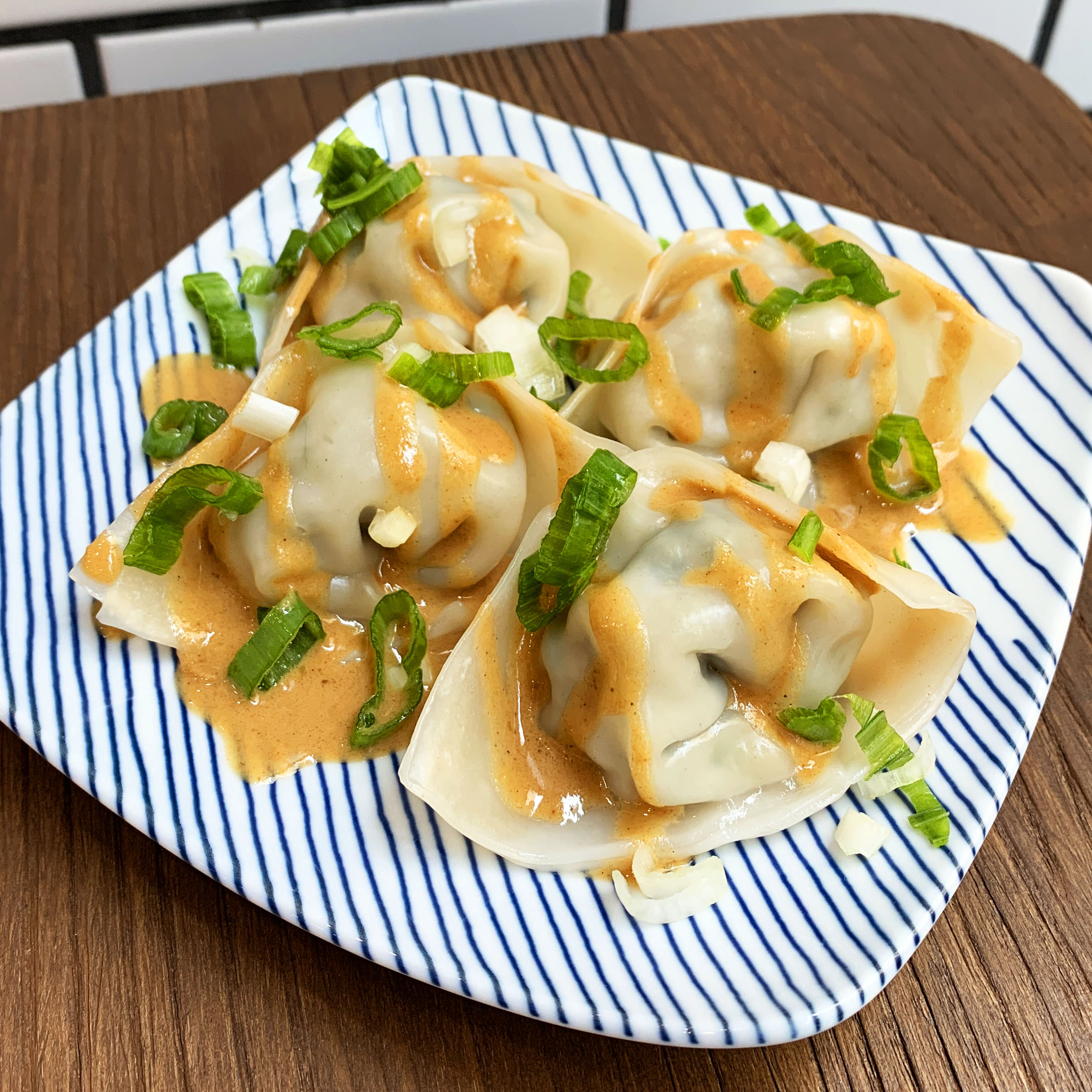 Order Chicken Wonton with Sesame Sauce food online from Stick To My Pot store, New York on bringmethat.com