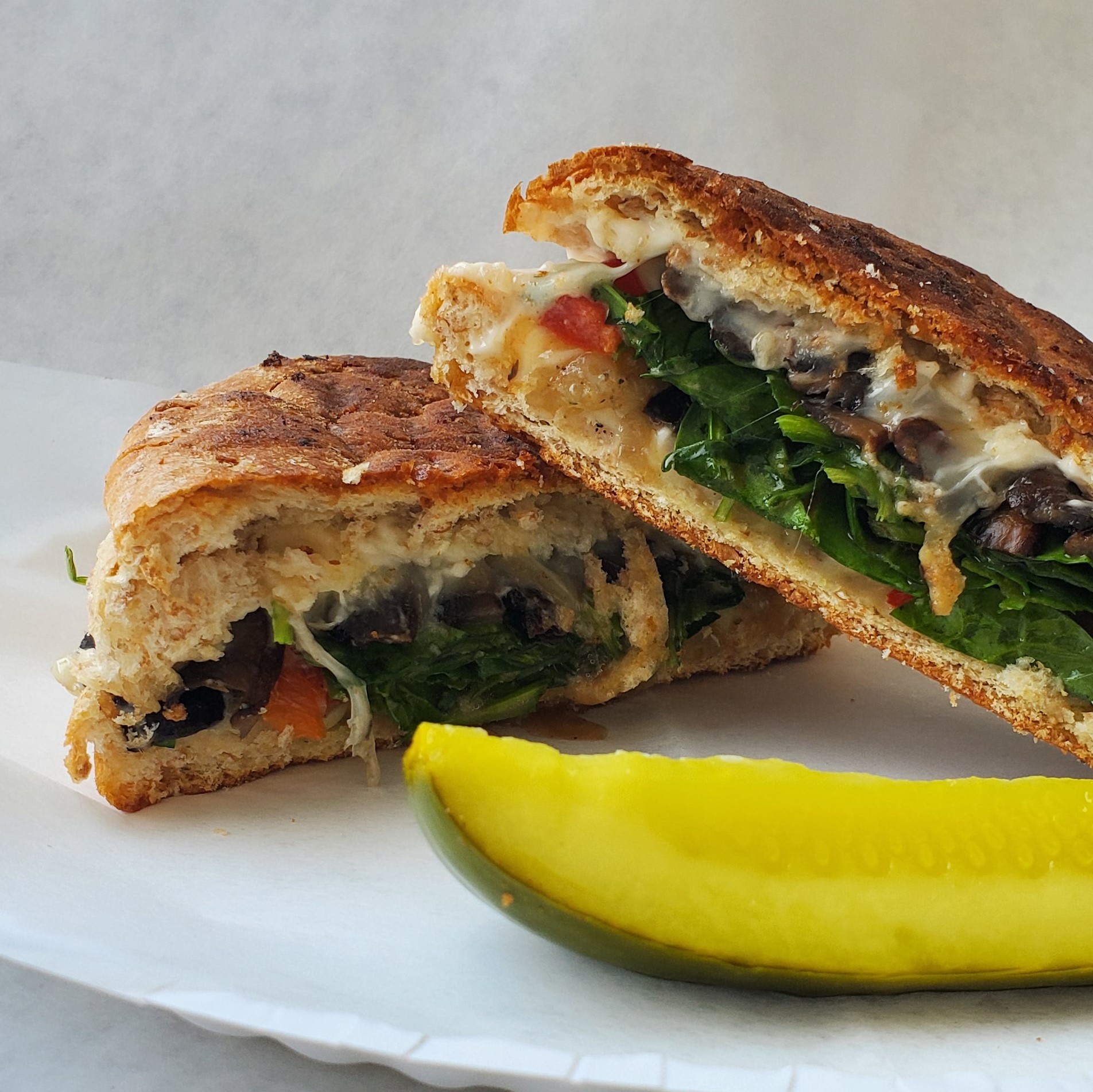 Order The Mediterranean Panini food online from Sundae & Fryday's Best store, Central Square on bringmethat.com