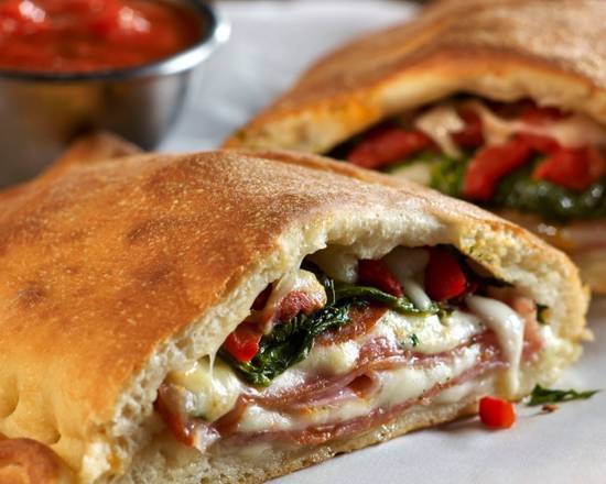 Order Deluxe Calzone food online from Pazzo pizzeria store, Los Angeles on bringmethat.com