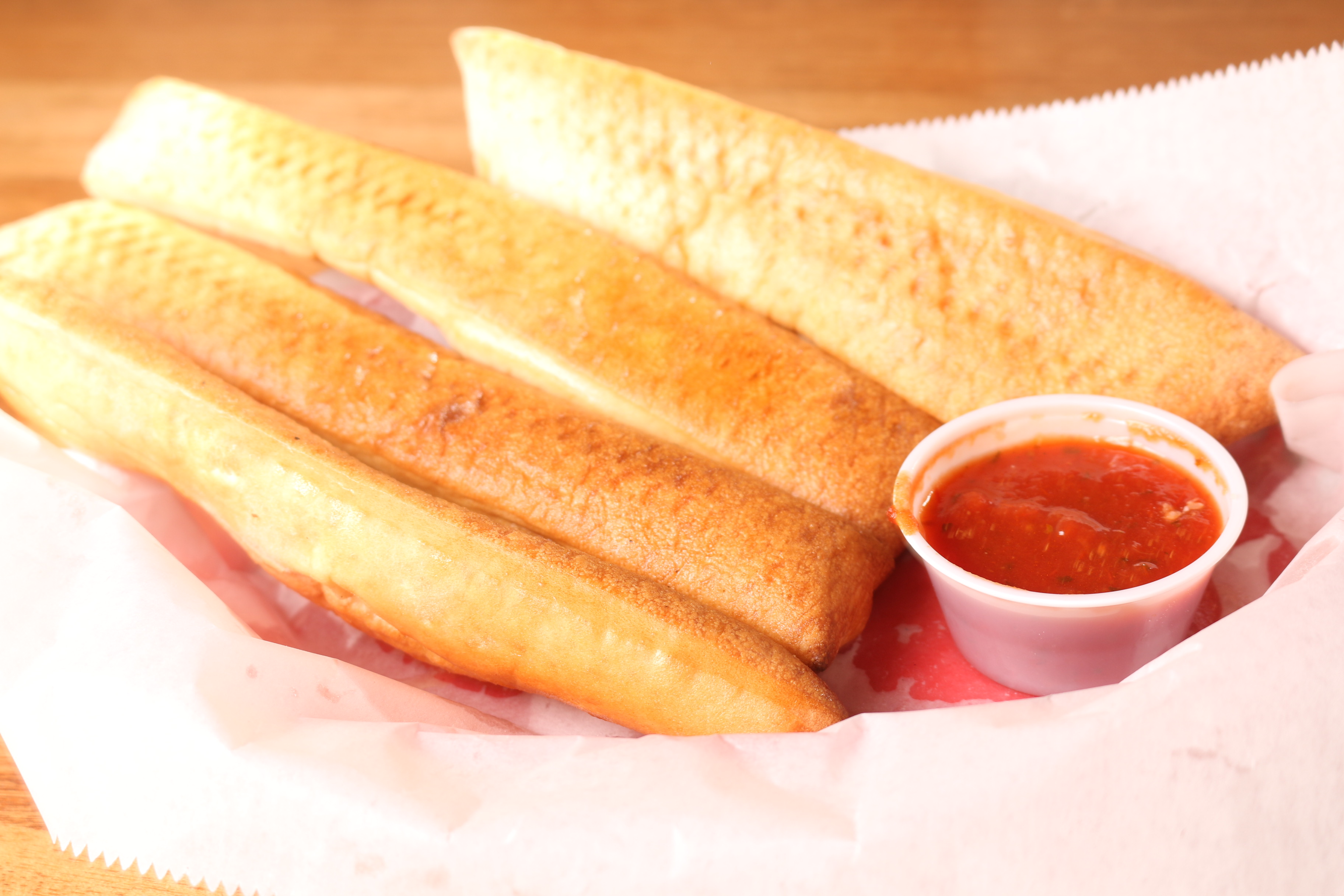 Order Breadsticks food online from UnCommon Pizza store, Lititz on bringmethat.com