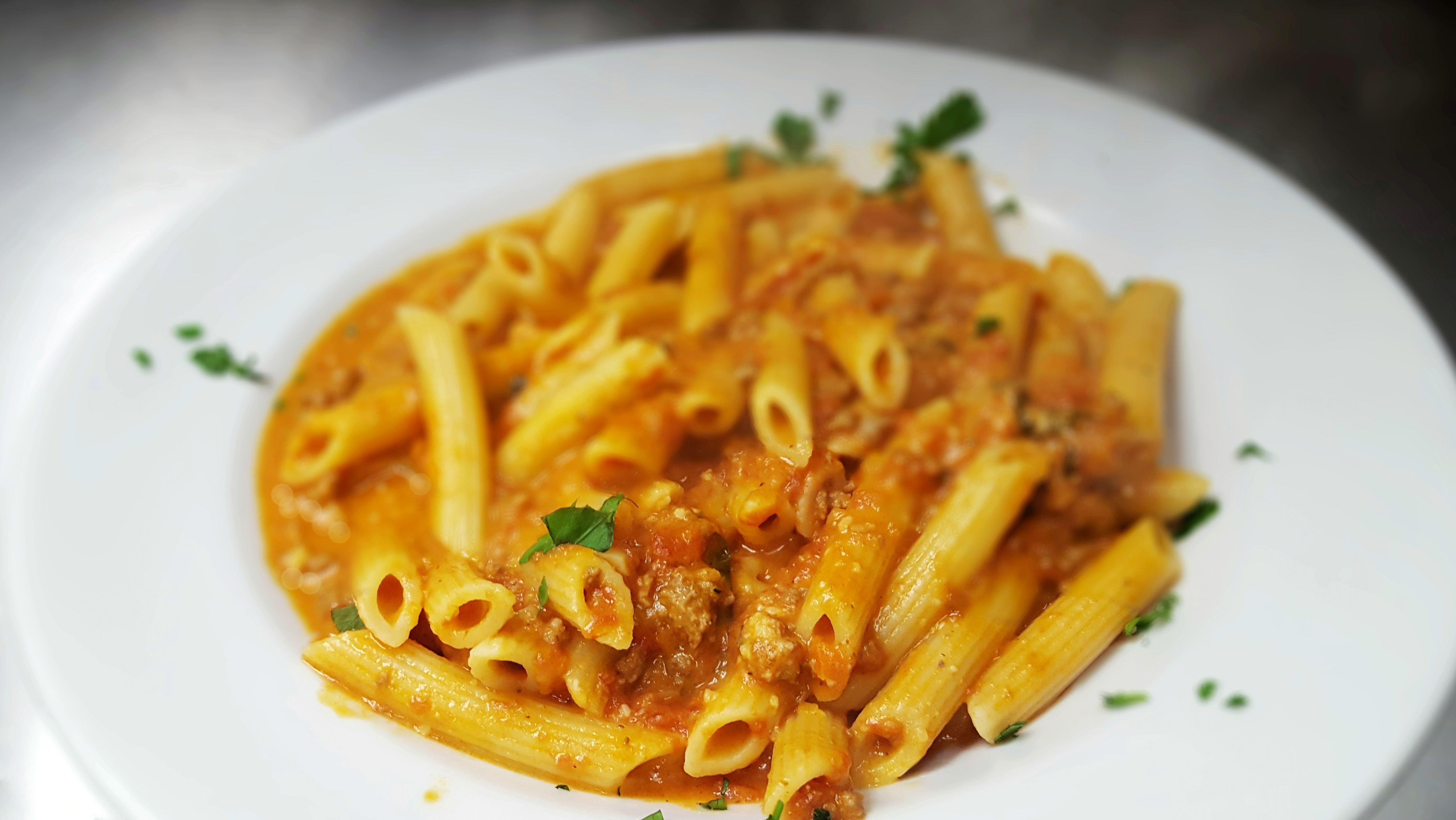 Order Penne Bolognese food online from Marios Pizza Center & Restaurant store, Middlesex on bringmethat.com
