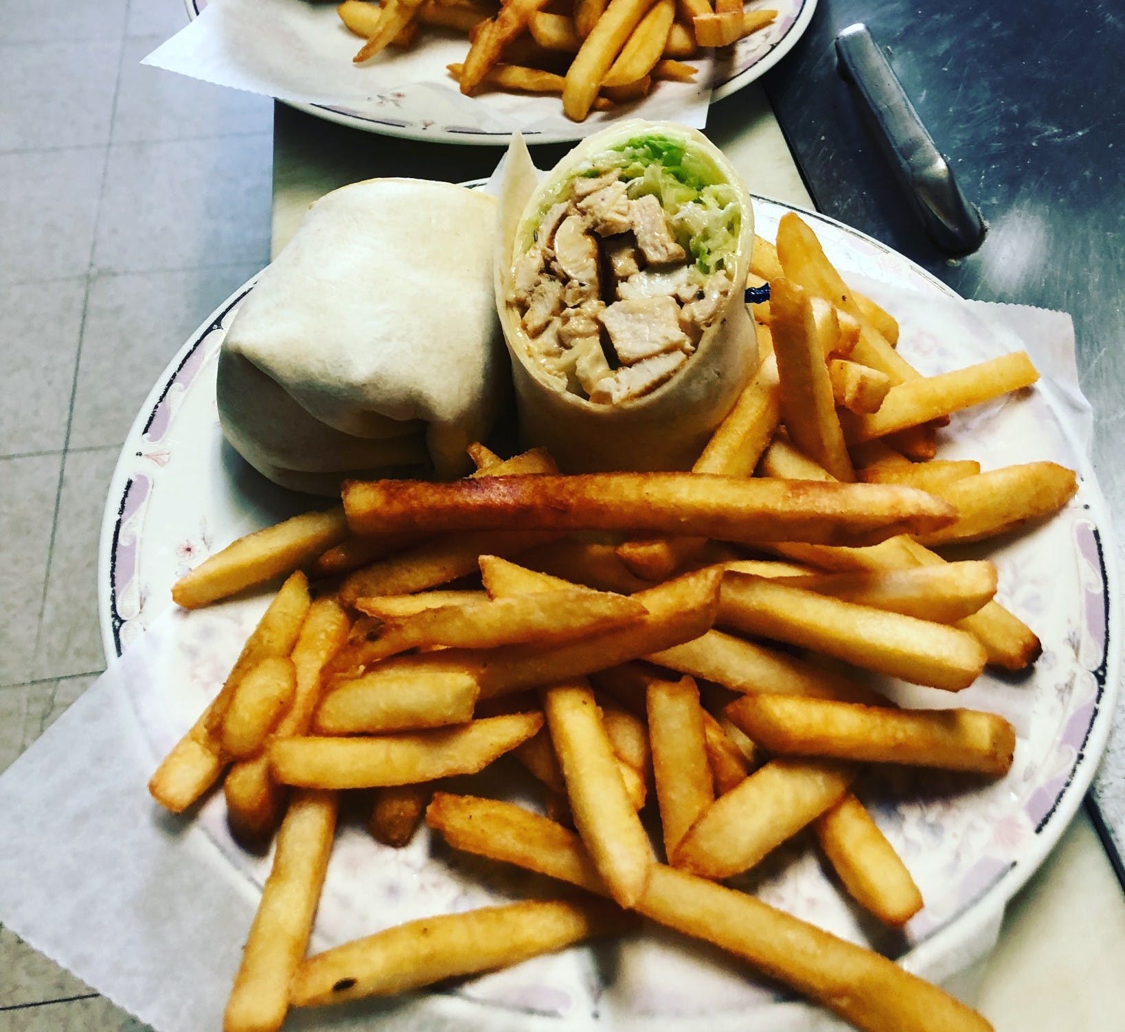 Order Grilled Chicken Wrap - Wrap food online from Kenny Pizzeria & Deli store, Old Saybrook on bringmethat.com