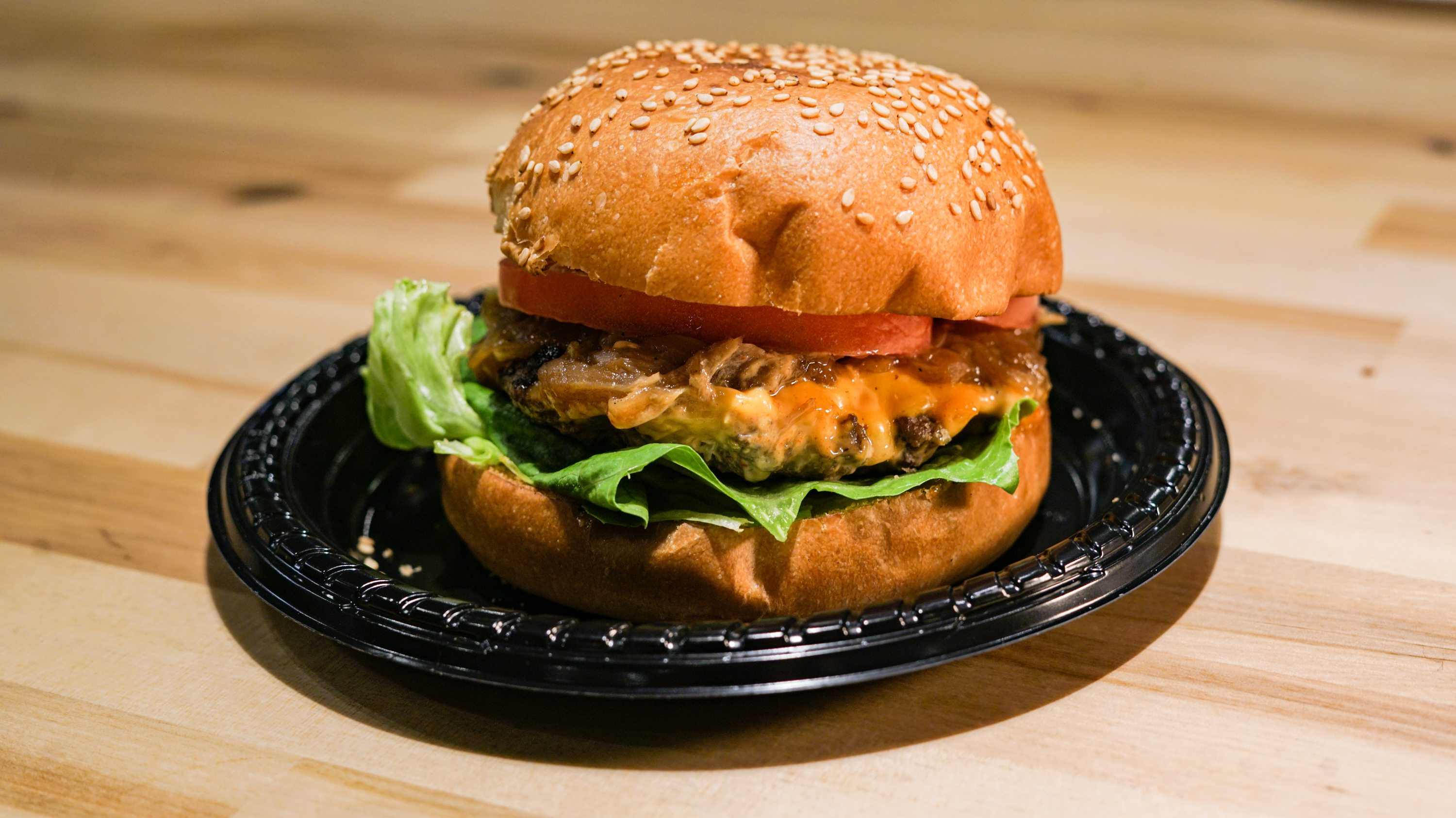 Order Signature Burger food online from Chick and Buns store, New York on bringmethat.com
