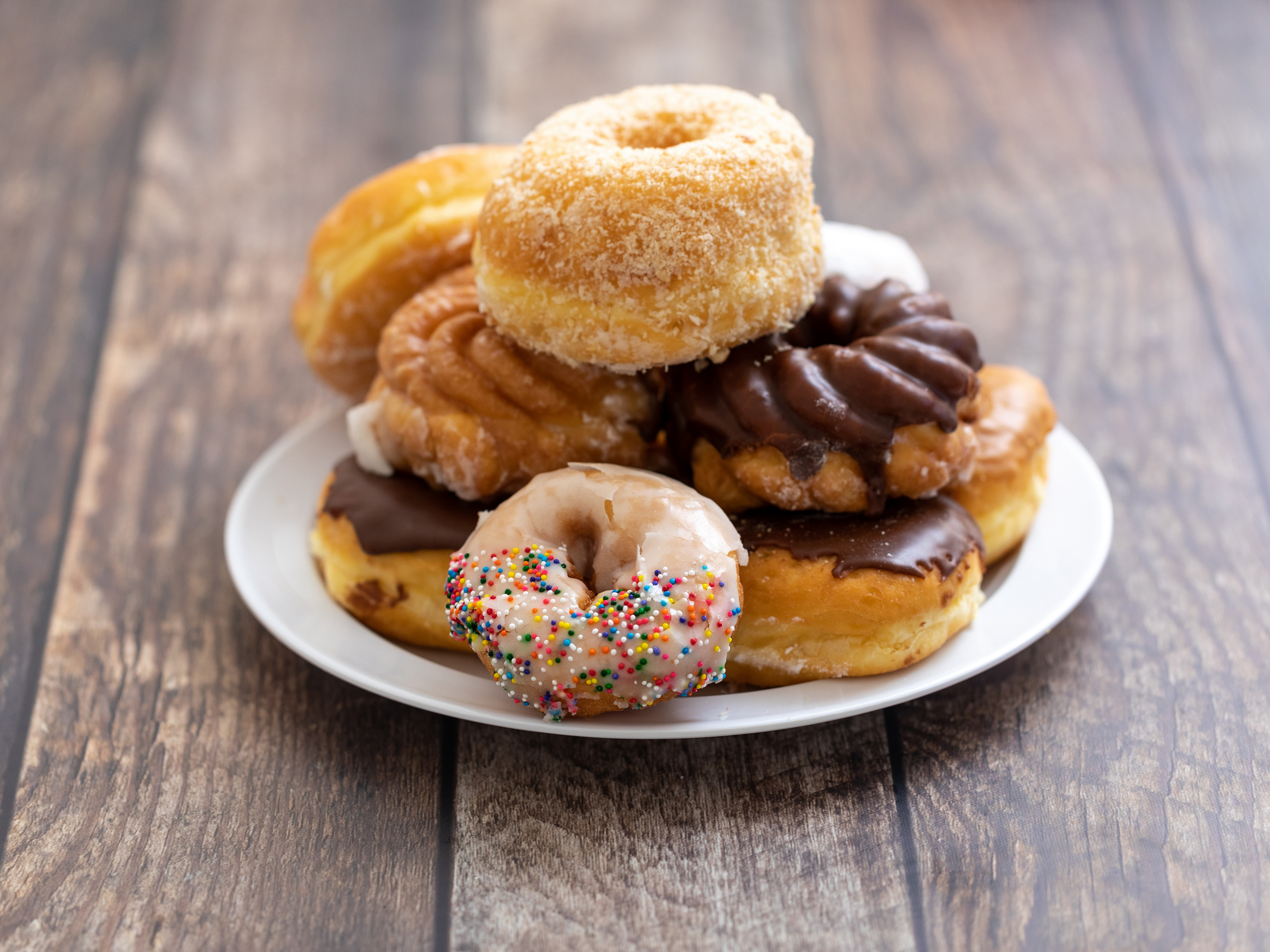 Order Upgrade Dozen Donut food online from Rolling Pin Donuts store, San Bruno on bringmethat.com