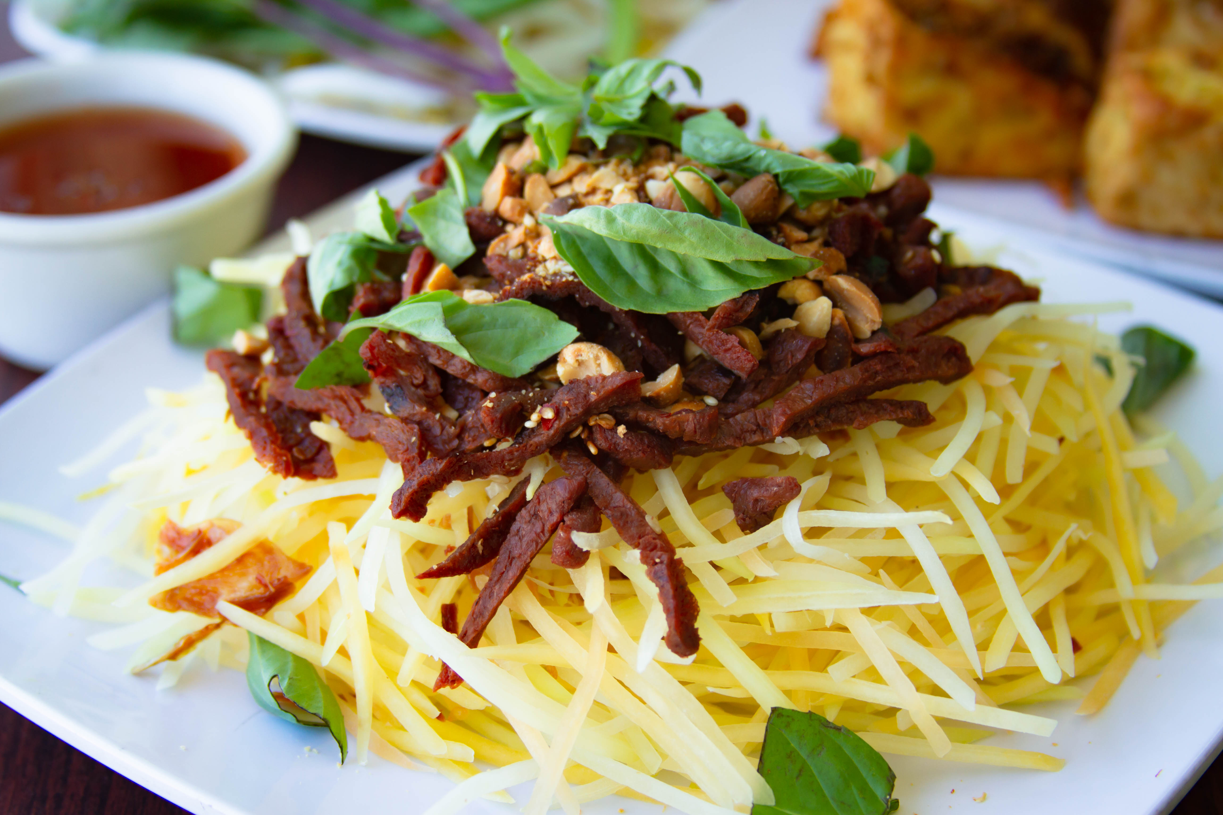 Order Papaya Salad with "Beef" Jerky food online from Thanh Tinh Chay store, San Diego on bringmethat.com