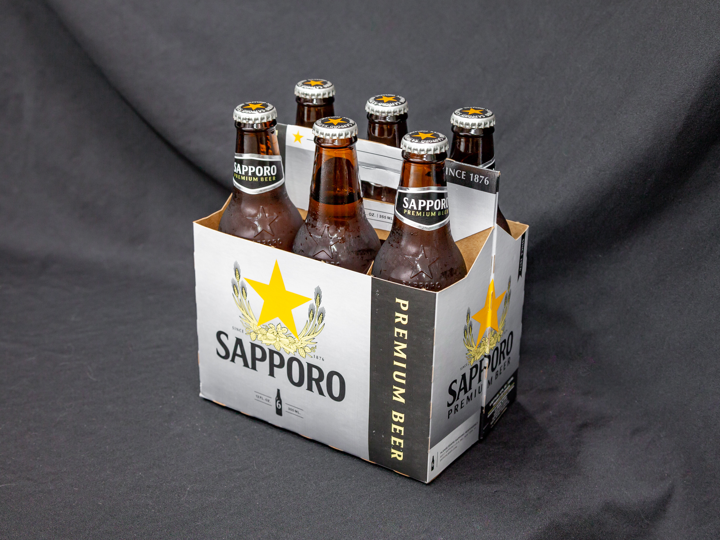 Order Sapporo Premium 6 Pack-12 oz. Bottle Beer food online from White Horse Liquors store, Oakland on bringmethat.com