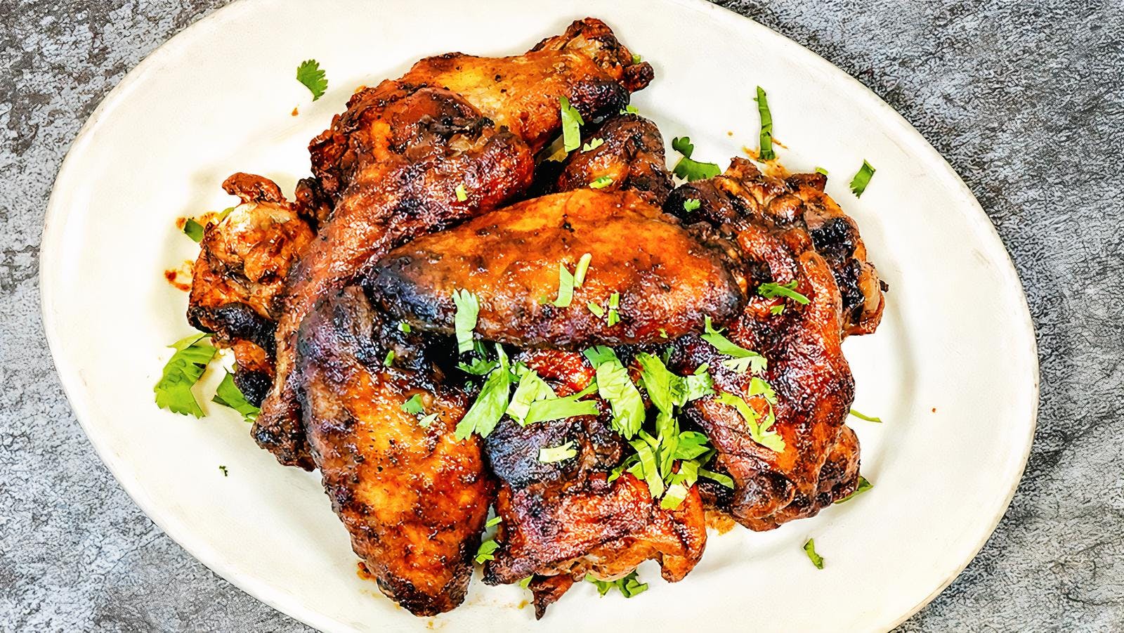 Order BBQ Style Chicken Wings - 5 Pieces food online from Pancake Playhouse store, San Francisco on bringmethat.com