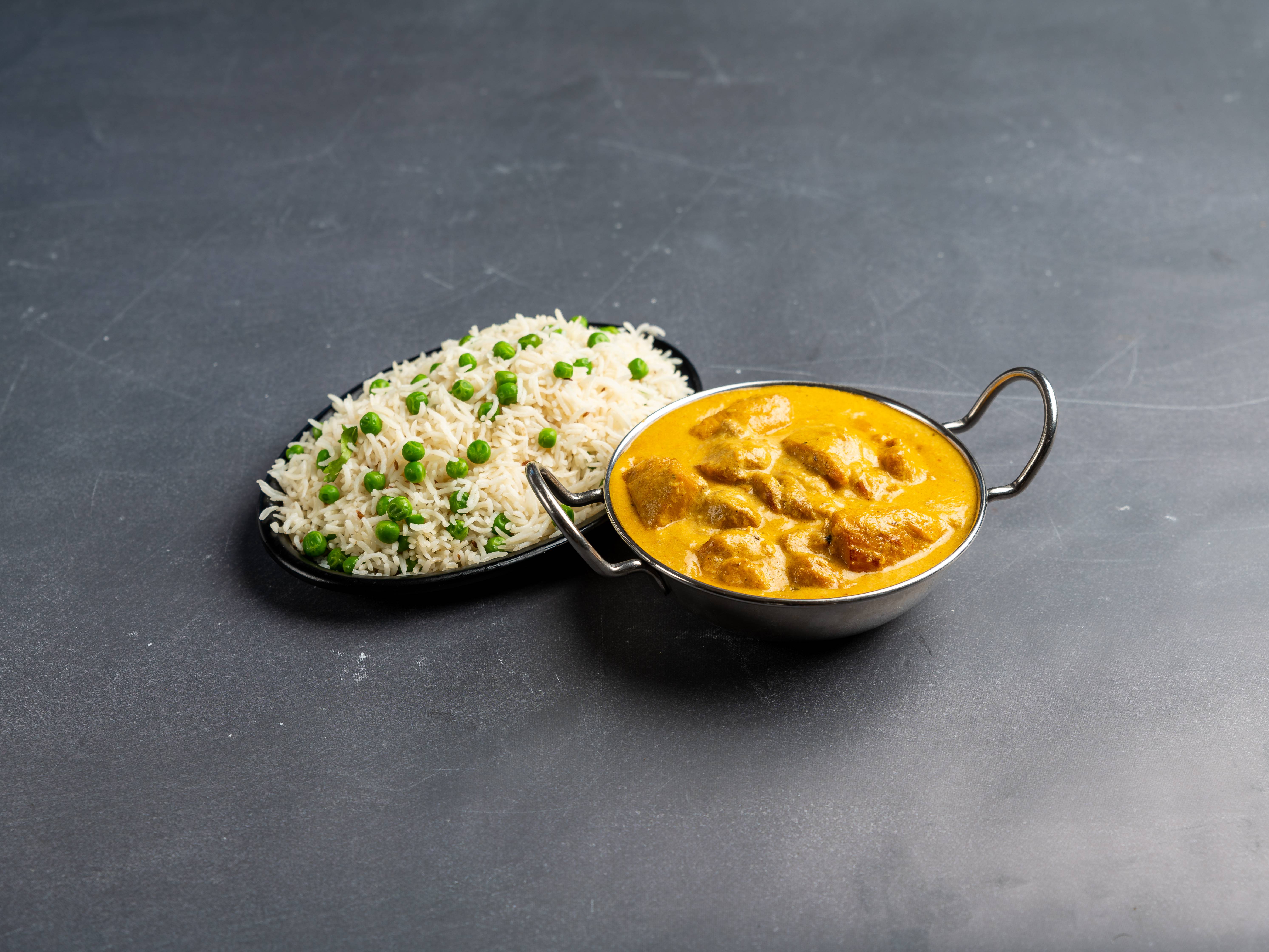 Order Chicken Coconut Korma food online from India Palace store, Cockeysville on bringmethat.com