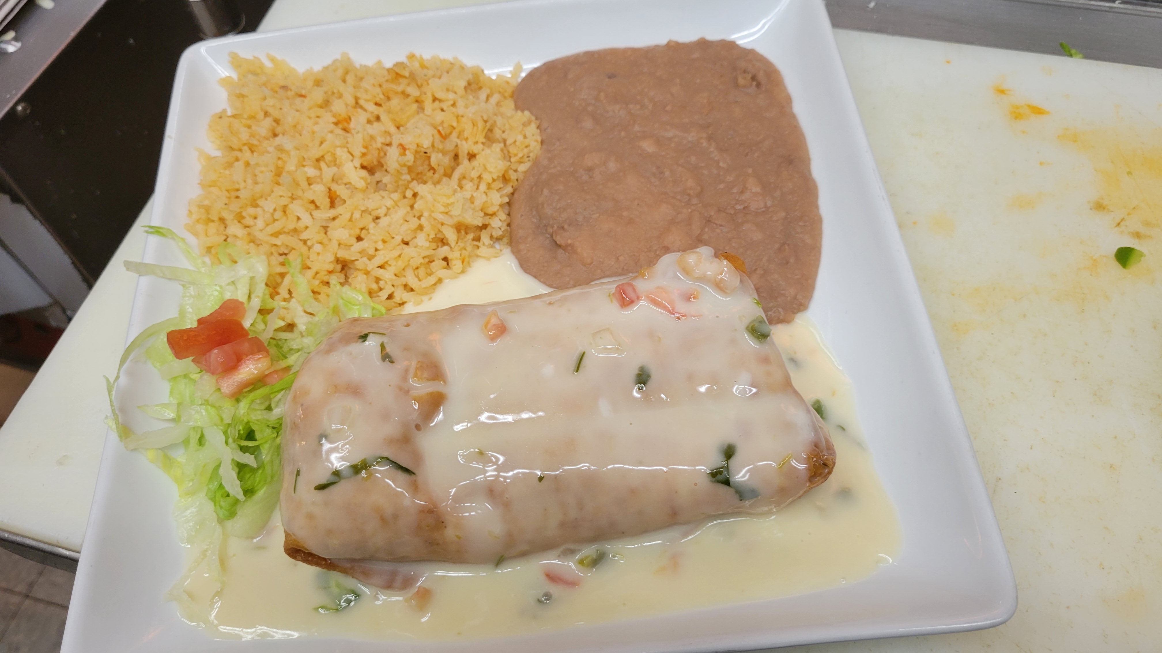 Order Chimichanga Dinner food online from Chilangos Authentic Mexican Cuisine store, Rockford on bringmethat.com