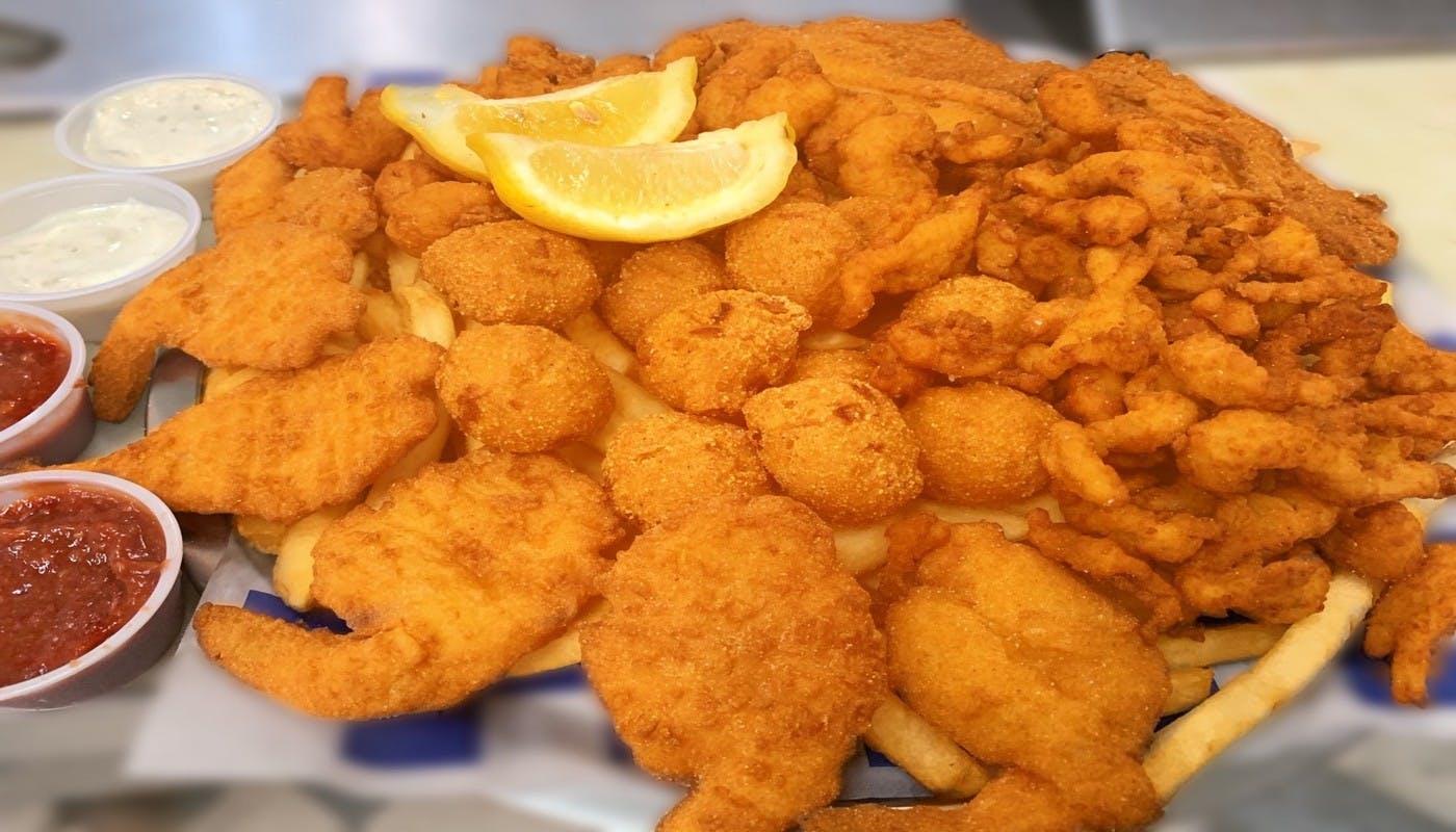 Order Seafood Platter - Entree food online from Village Pizza & Seafood store, Dickinson on bringmethat.com