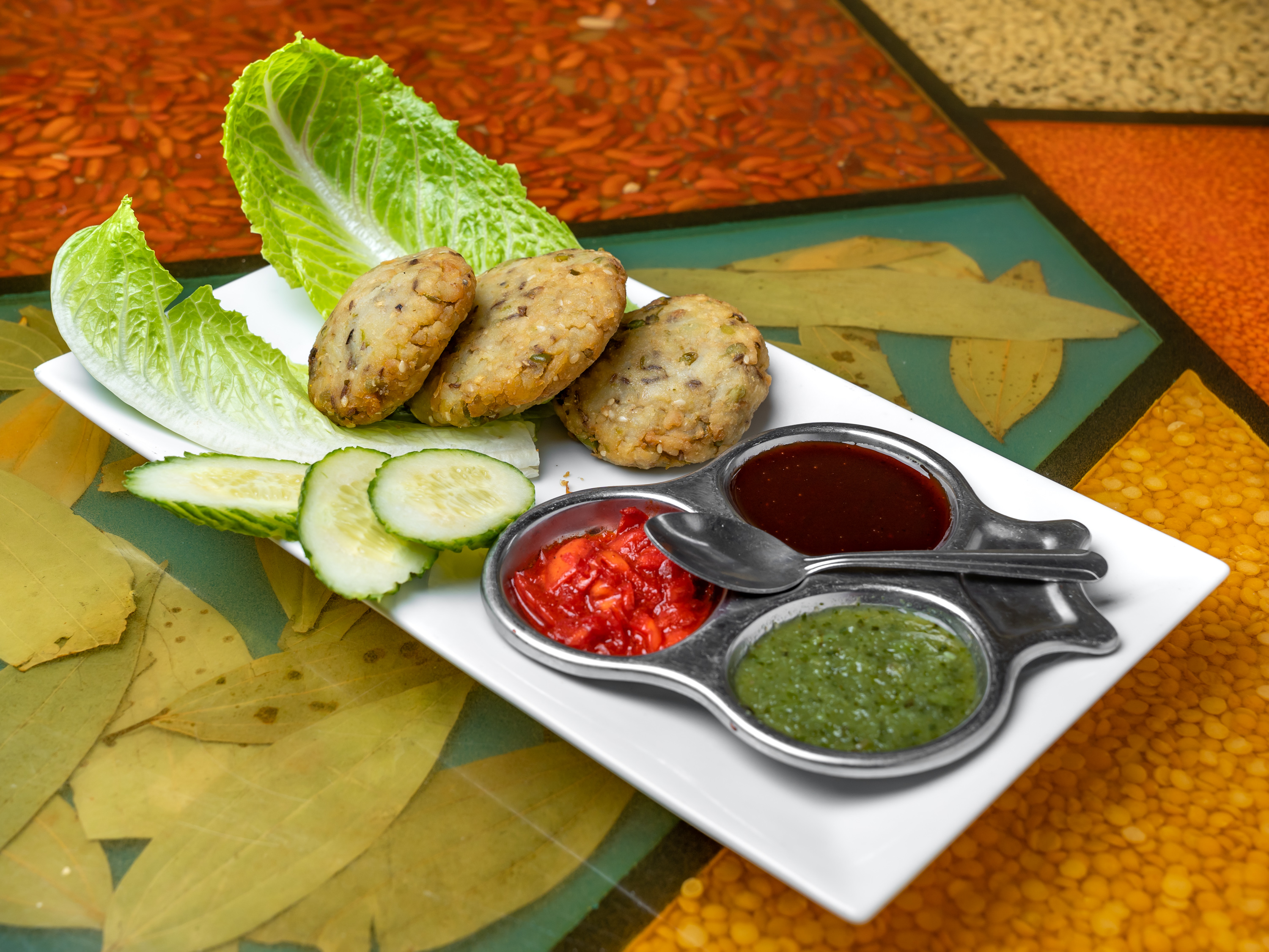 Order Aloo Tikki food online from Singhs Cafe store, Wellesley Hills on bringmethat.com