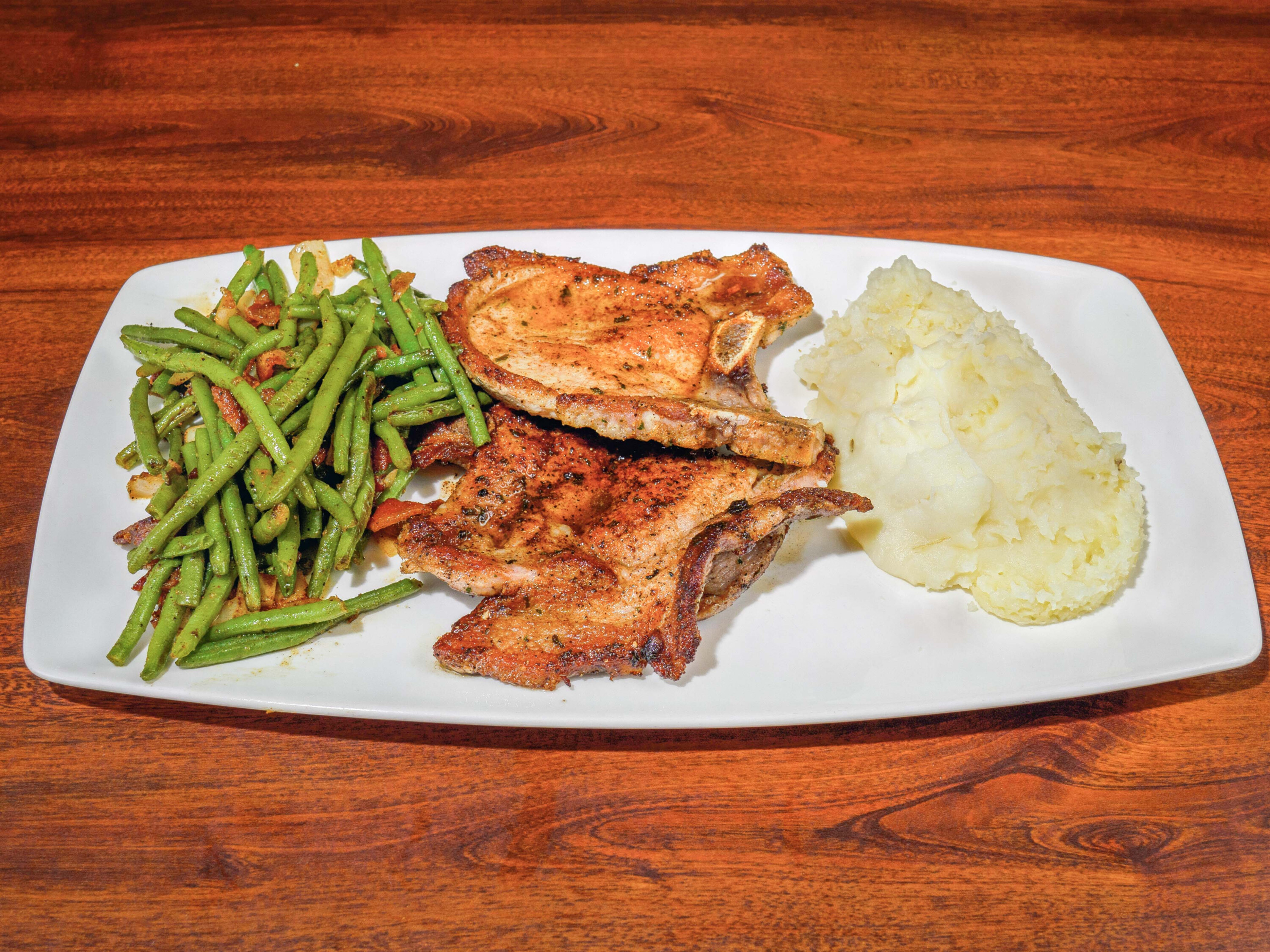 Order Bacon’s Pork Chops Plate food online from Bacon's Bistro and Cafe store, Hurst on bringmethat.com