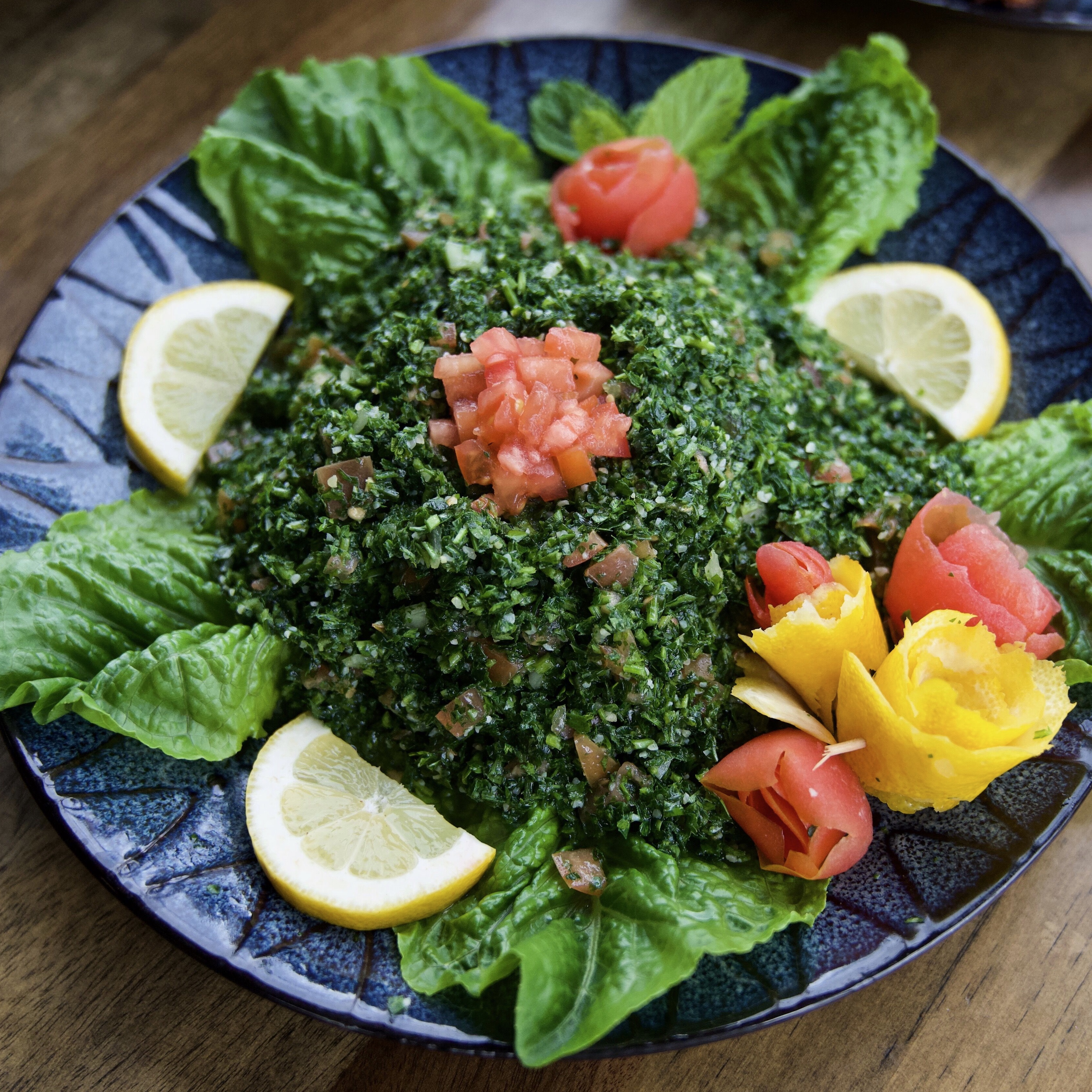 Order Tabouli Salad (Vegetarian) food online from Heights Meat Market & Grill store, Dearborn Heights on bringmethat.com