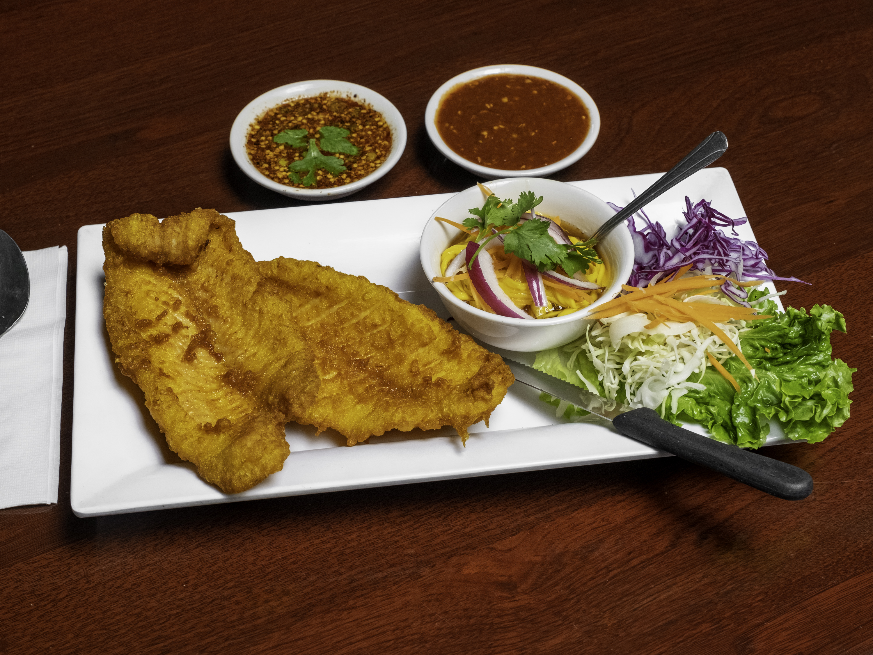 order online - Fried fish with mango salad from Thai Nakorn on bringmethat.com
