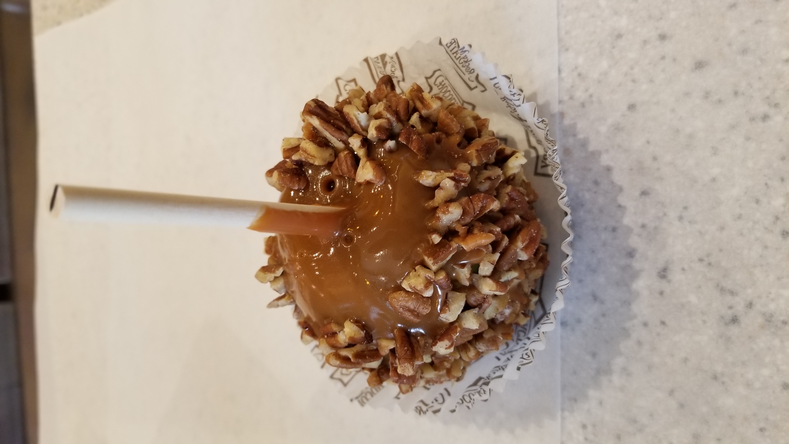 Order Pecan Caramel Apple food online from Rocky Mountain Chocolate Factory store, Tempe on bringmethat.com