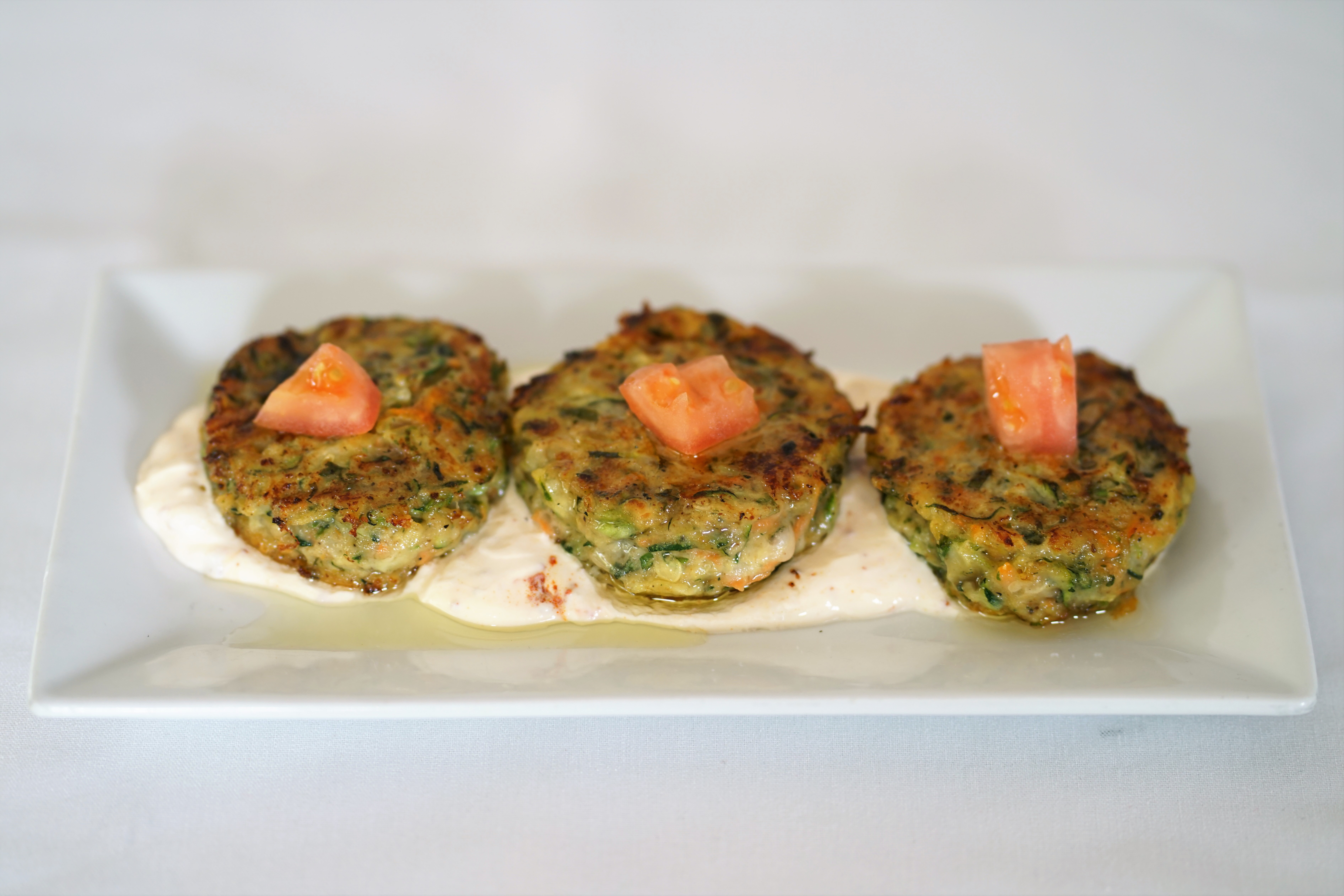 Order Zucchini Pancakes food online from Lezzet Restaurant store, Centreville on bringmethat.com