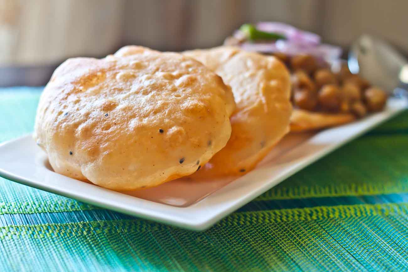 Order 93. Bhatura food online from Desi Spice store, Grand Rapids on bringmethat.com