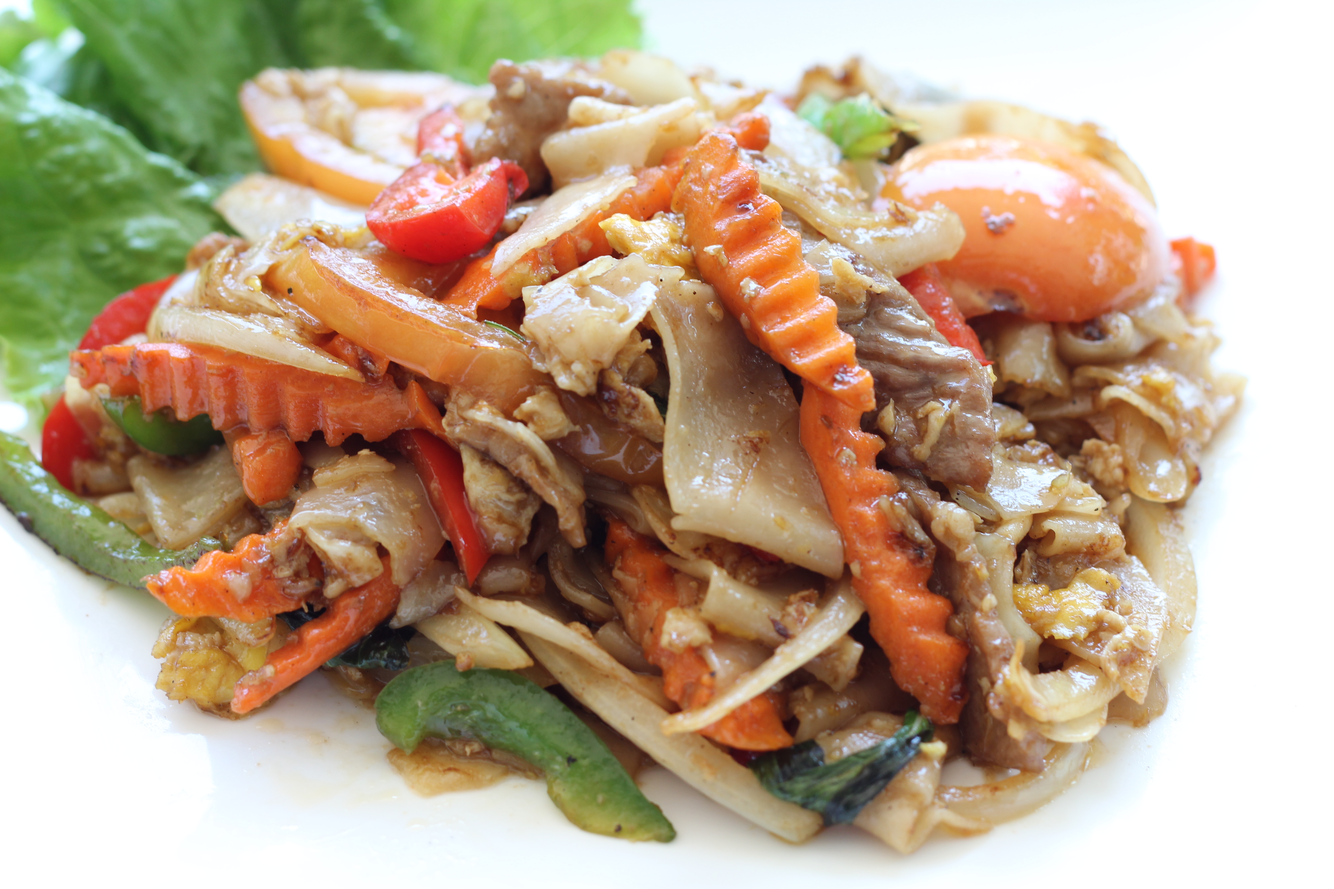 Order 31. Drunken Noodles food online from Aroma Thai store, Santa Clarita on bringmethat.com