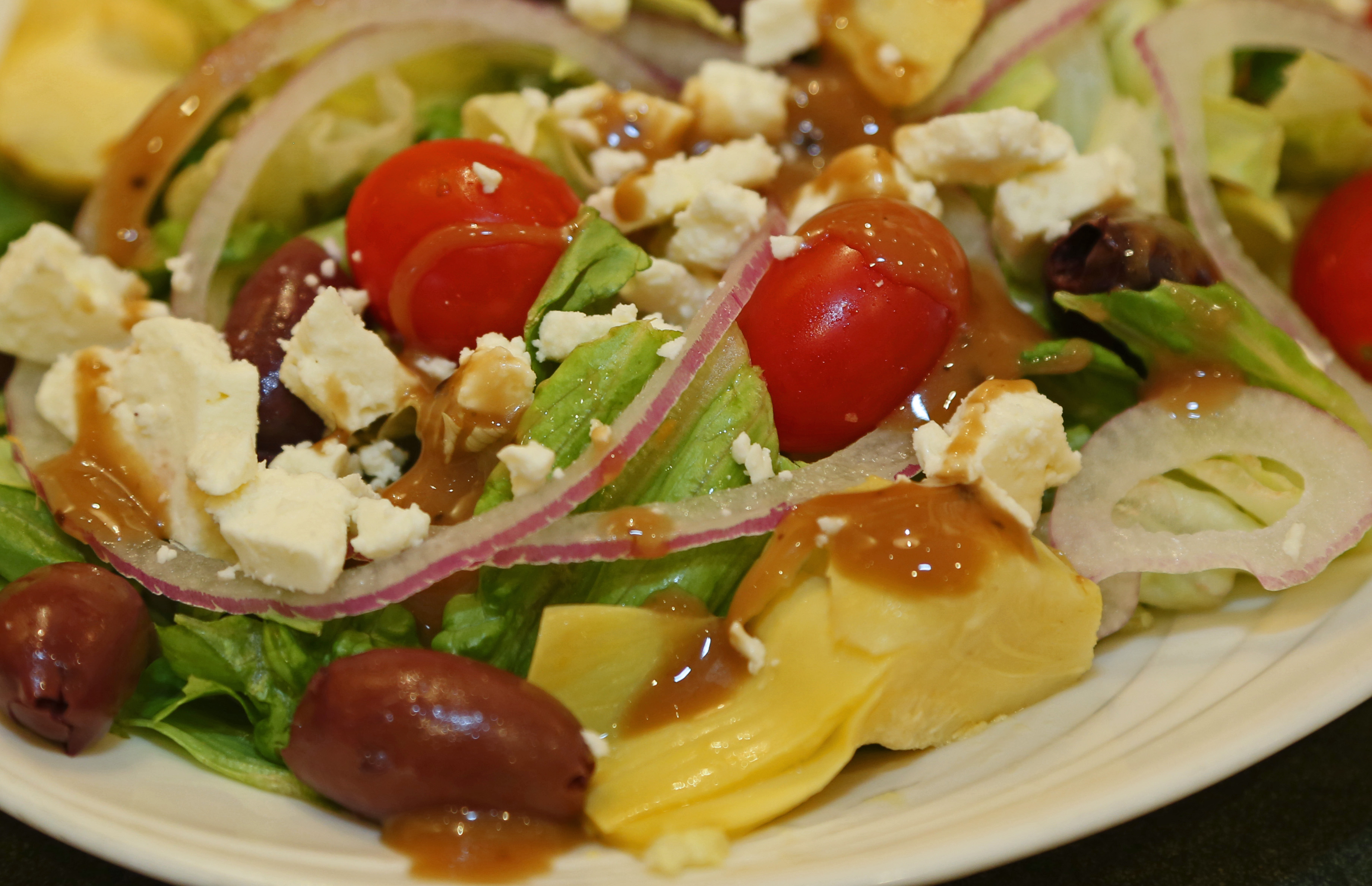 Order Greek Salad food online from Armand's Pizzeria & Grille store, Rockville on bringmethat.com
