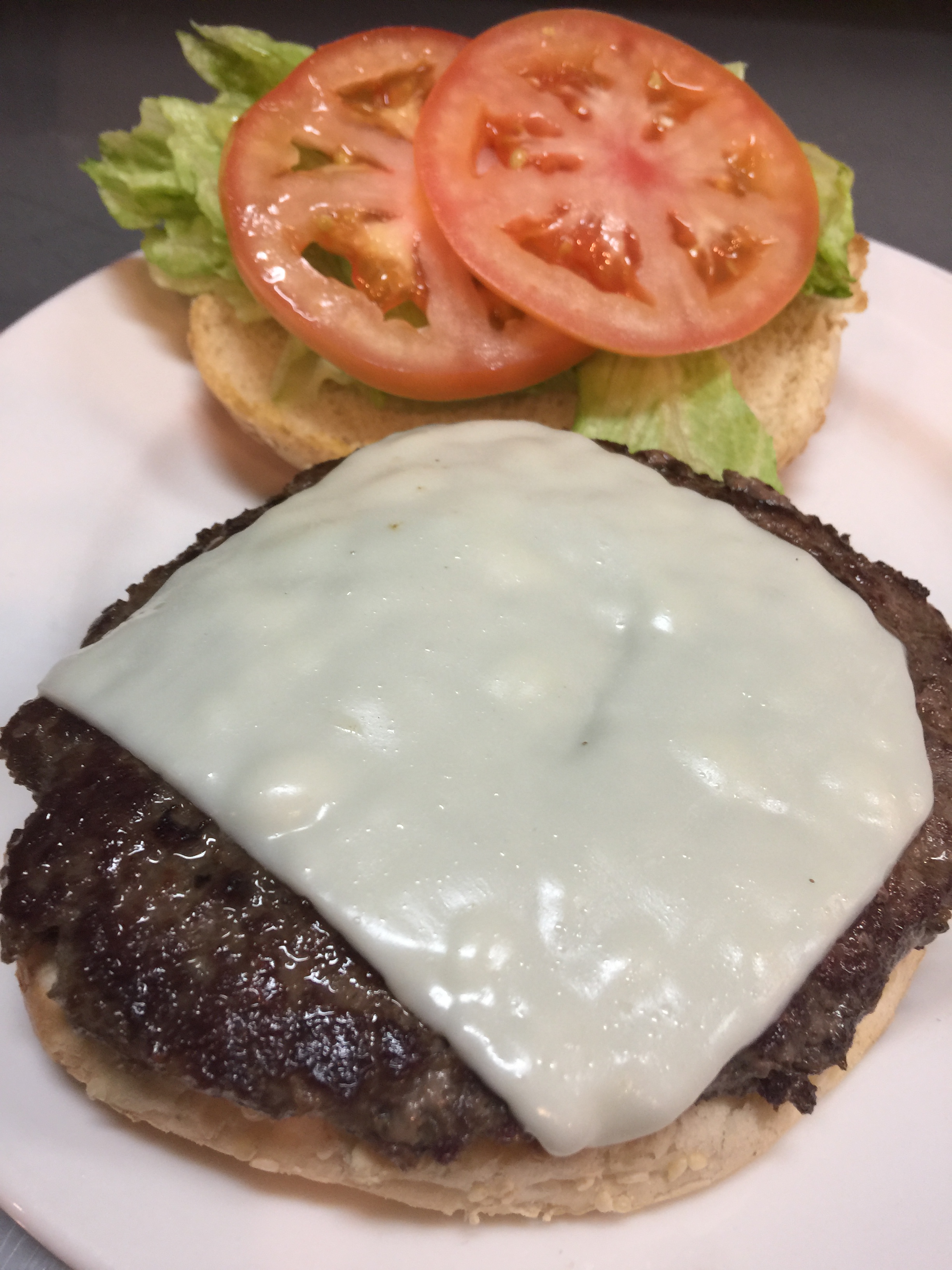 Order 6 oz. Cheeseburger food online from Husky Pizza store, Coventry on bringmethat.com