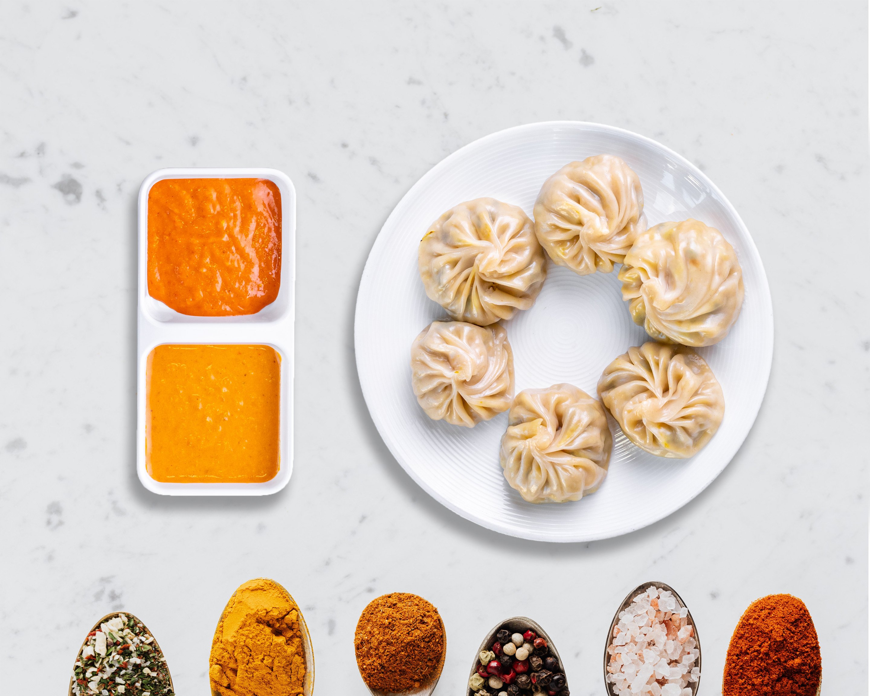 Order Juicy Chicken Momos food online from Arranged Marriage Symphony store, San Jose on bringmethat.com