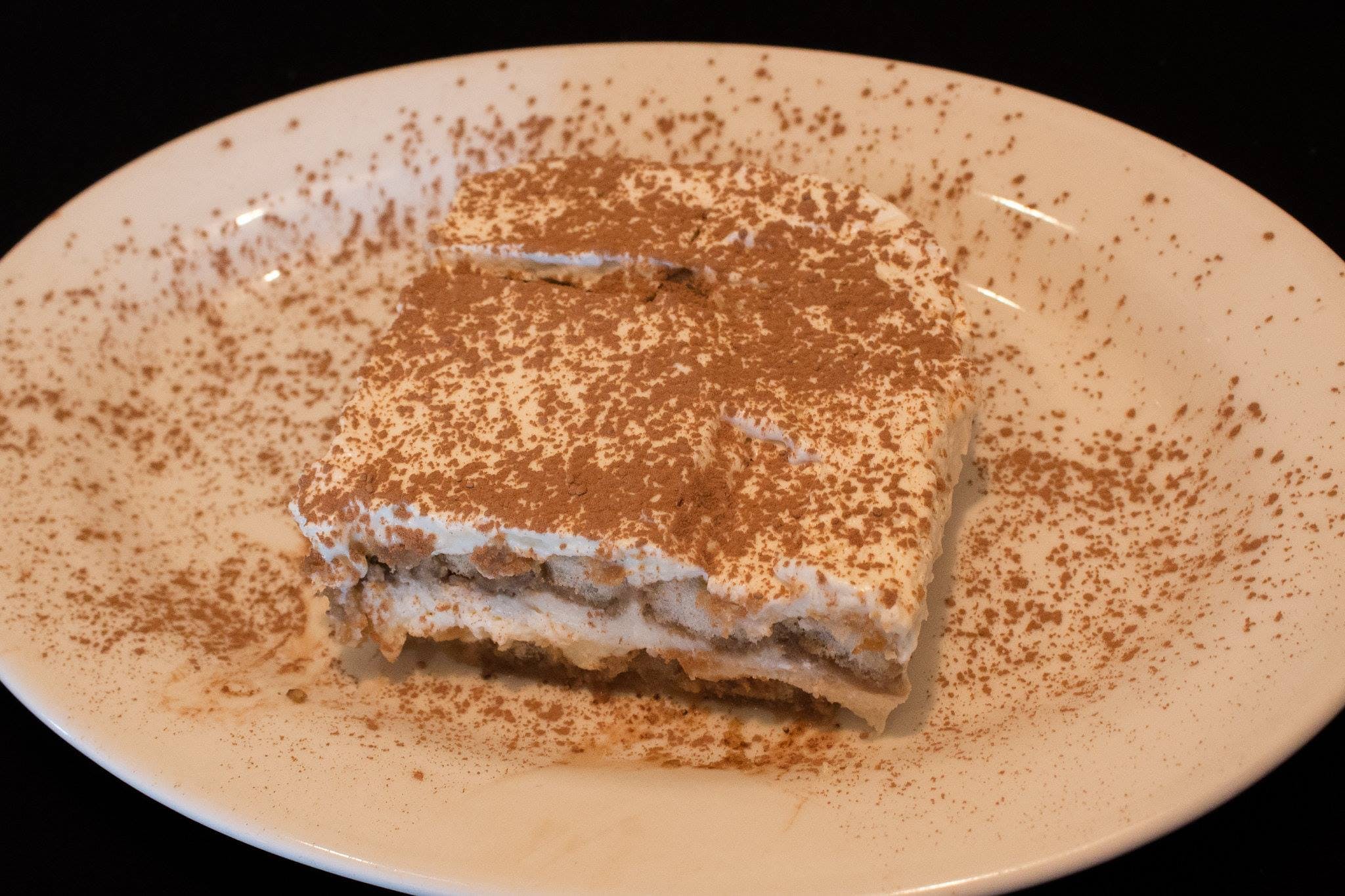 Order Tiramisu - Dessert food online from Biba's Italian Restaurant  store, Milledgeville on bringmethat.com