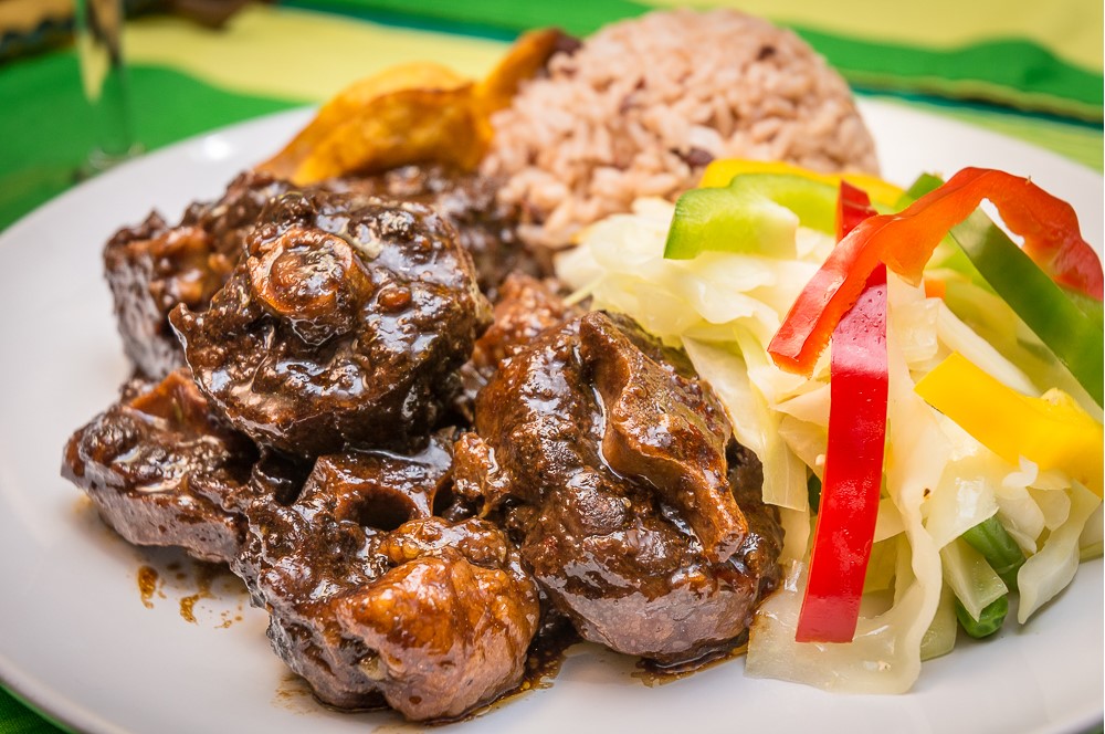 Order Oxtail Meat Dish food online from Island Jerk store, North Babylon on bringmethat.com