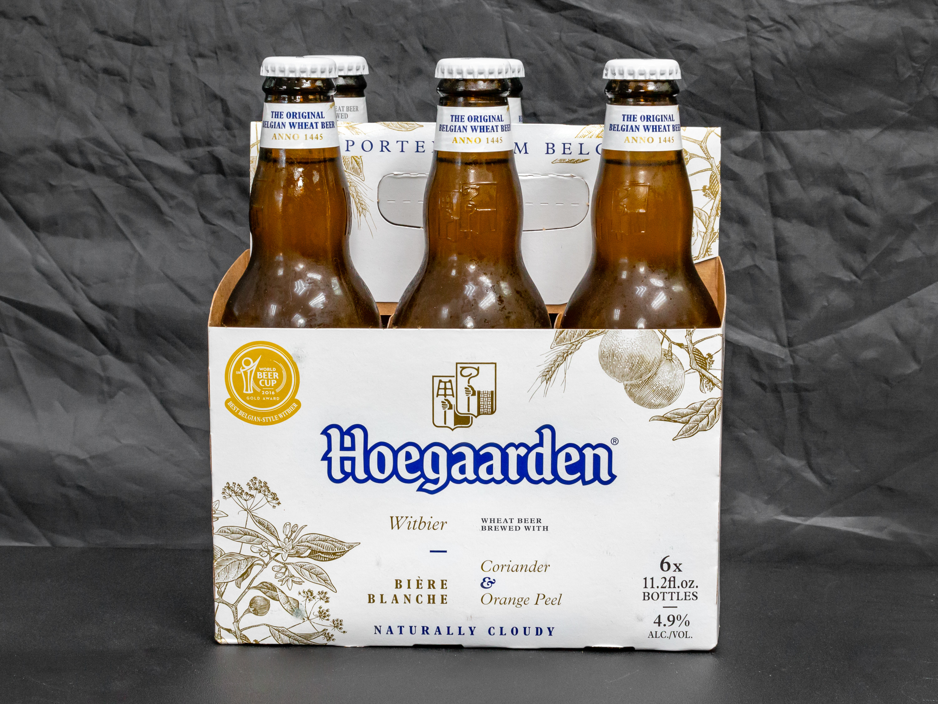 Order Hoegaarden White Beer food online from Armanetti Liquors store, Niles on bringmethat.com