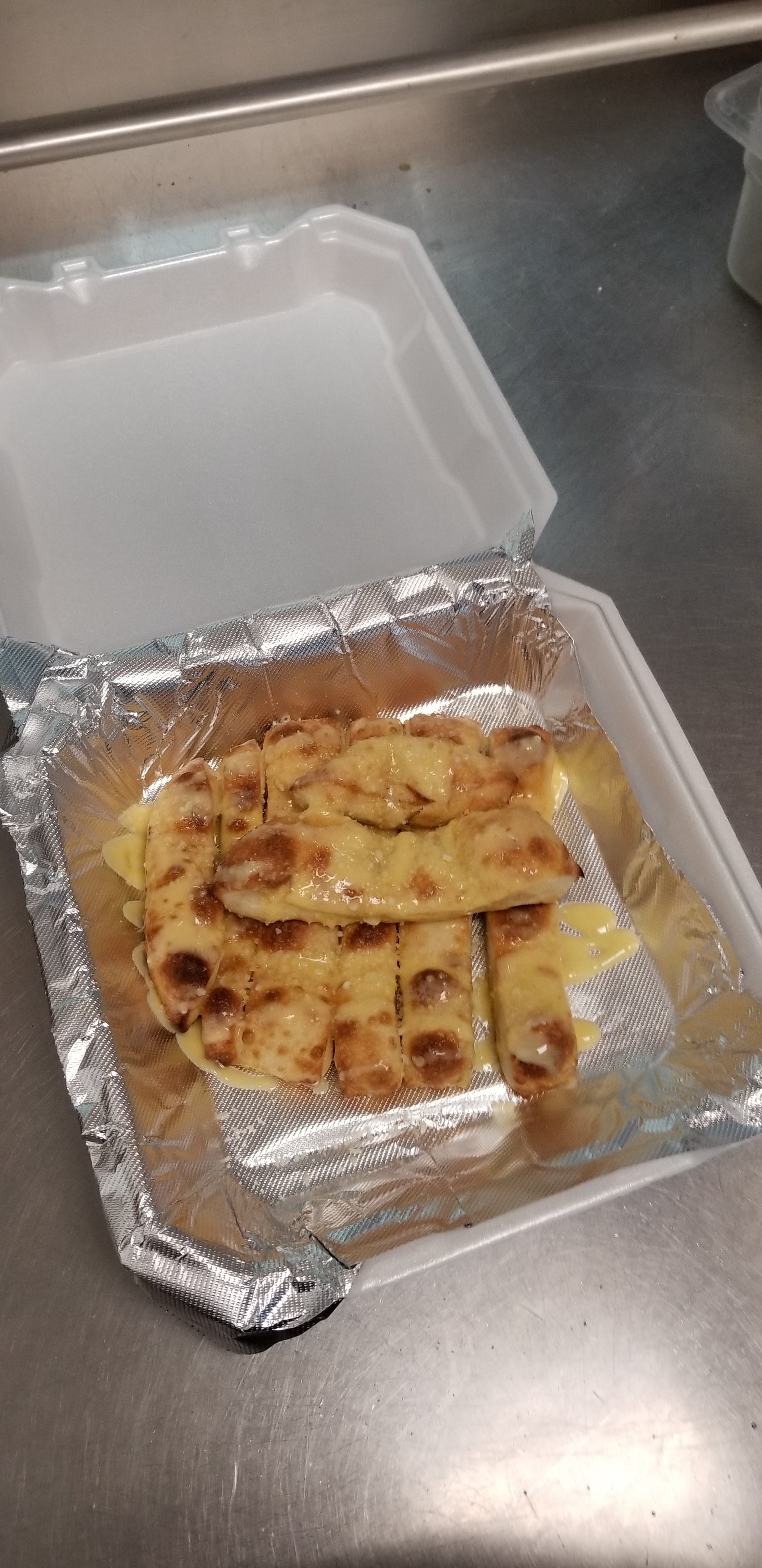 Order Breadsticks - Single food online from Golden Pizza store, San Bernardino on bringmethat.com