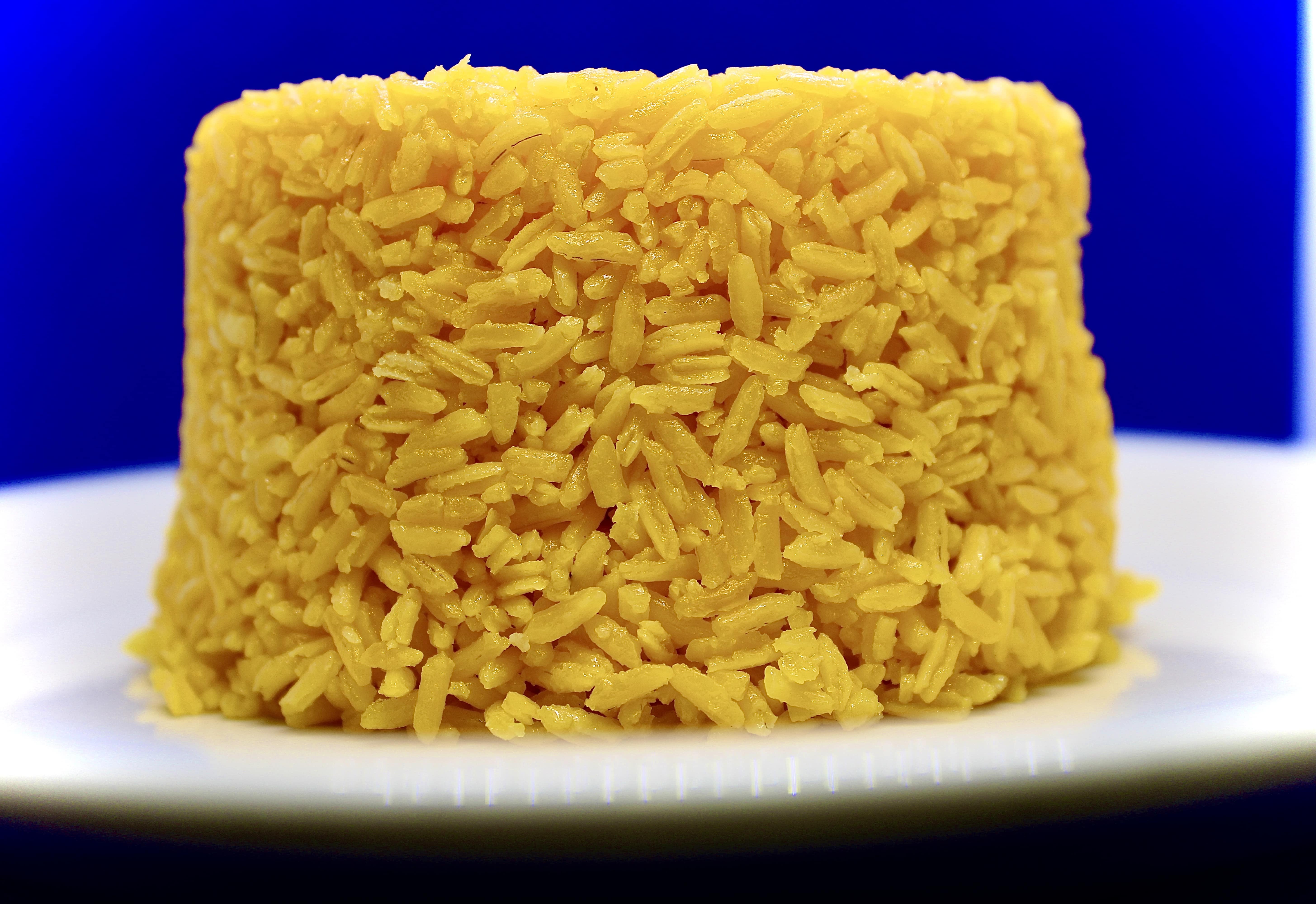 Order Yellow Rice food online from El Barajo Restaurant store, Utica on bringmethat.com
