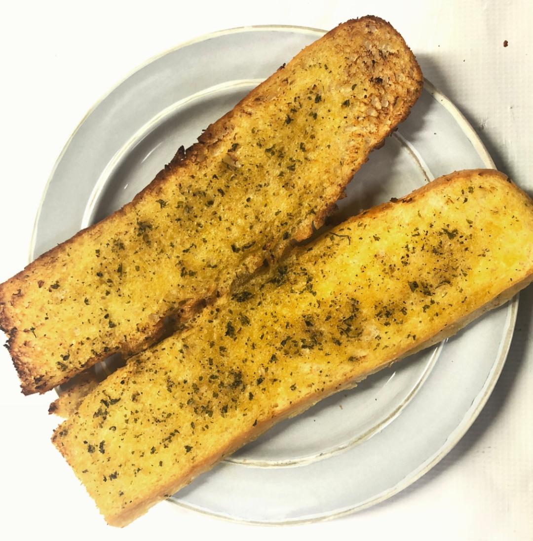 Order Garlic Bread Appetizer food online from Guido's Pizza and Pasta store, Northridge on bringmethat.com