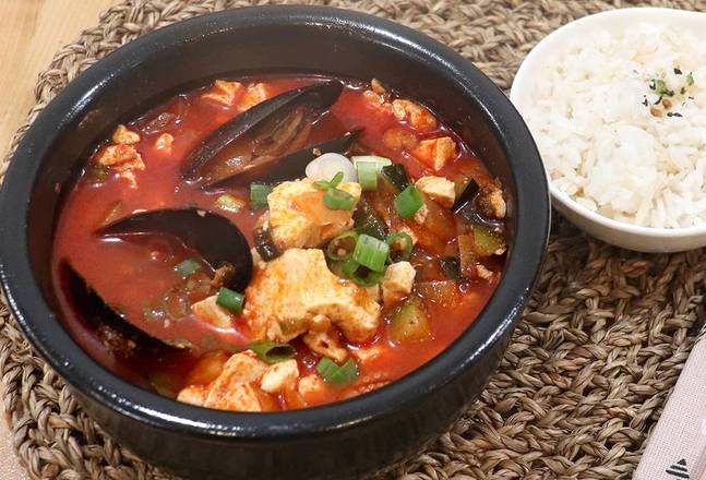 Order Spicy seafood tofu soup food online from Kitchen Woori store, San Francisco on bringmethat.com