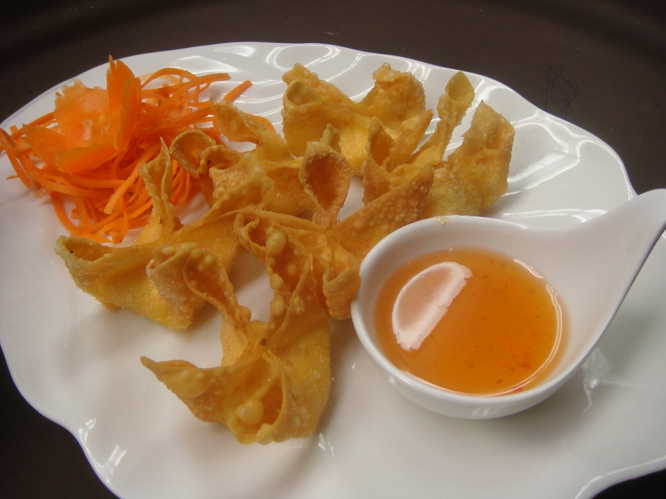 Order A11. Crab Rangoon -3PD food online from Chaang Thai Restaurant store, Morgantown on bringmethat.com