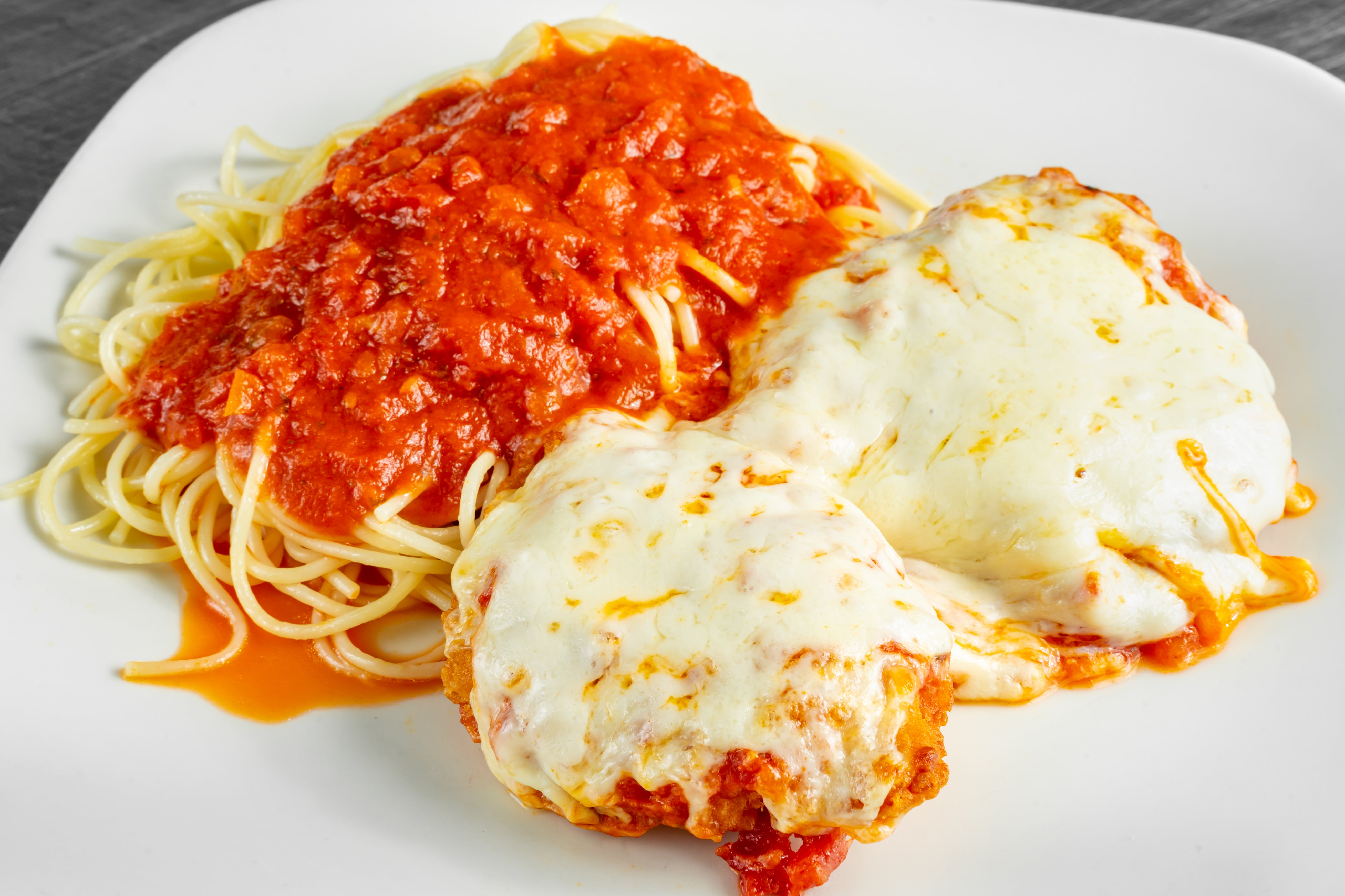 Order Chicken Parmigiana - Entree food online from Joe's Pizza Pasta & Subs store, Justin on bringmethat.com