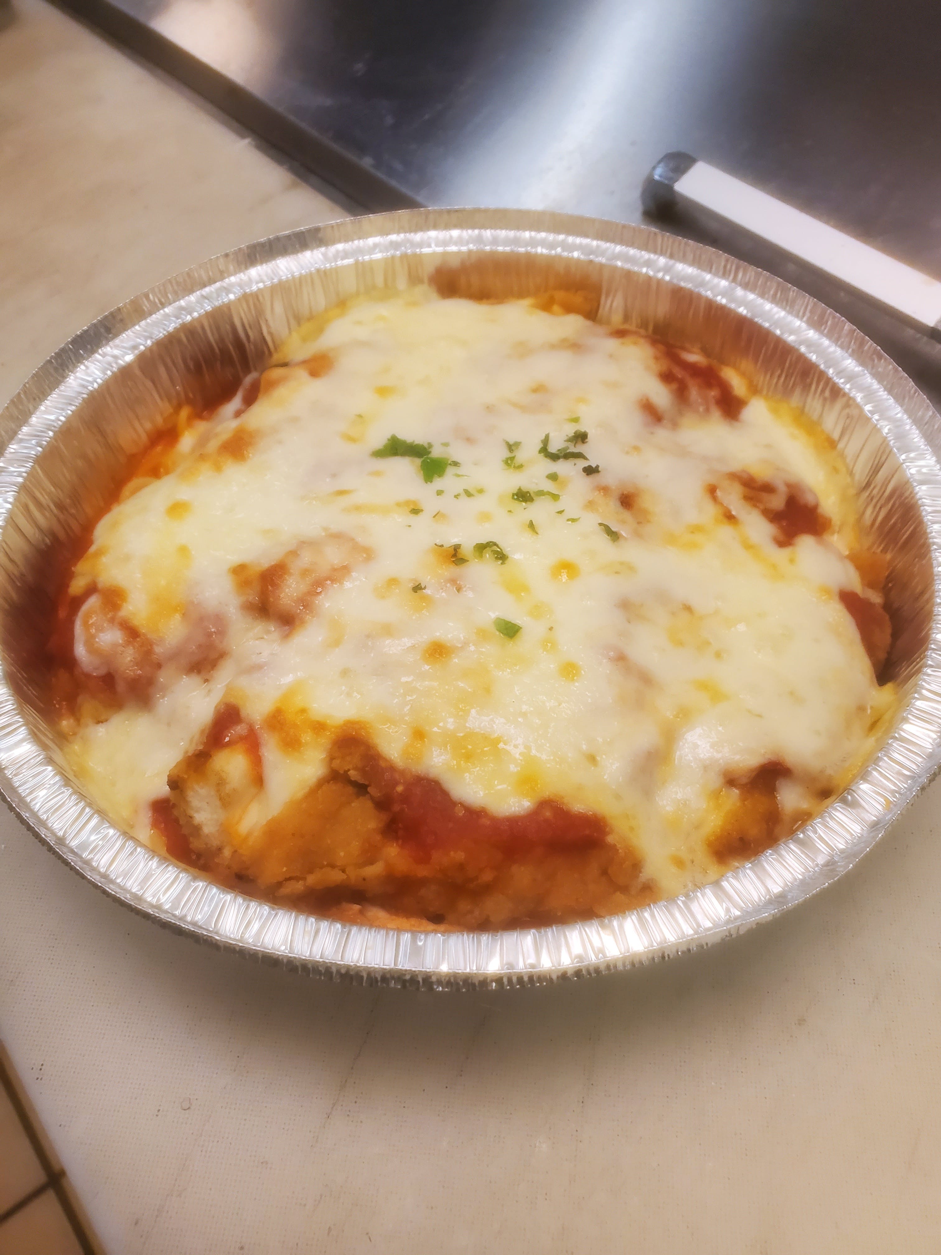 Order Chicken Parm Spaghetti - Pasta food online from Pizza Leone store, Fairfield on bringmethat.com