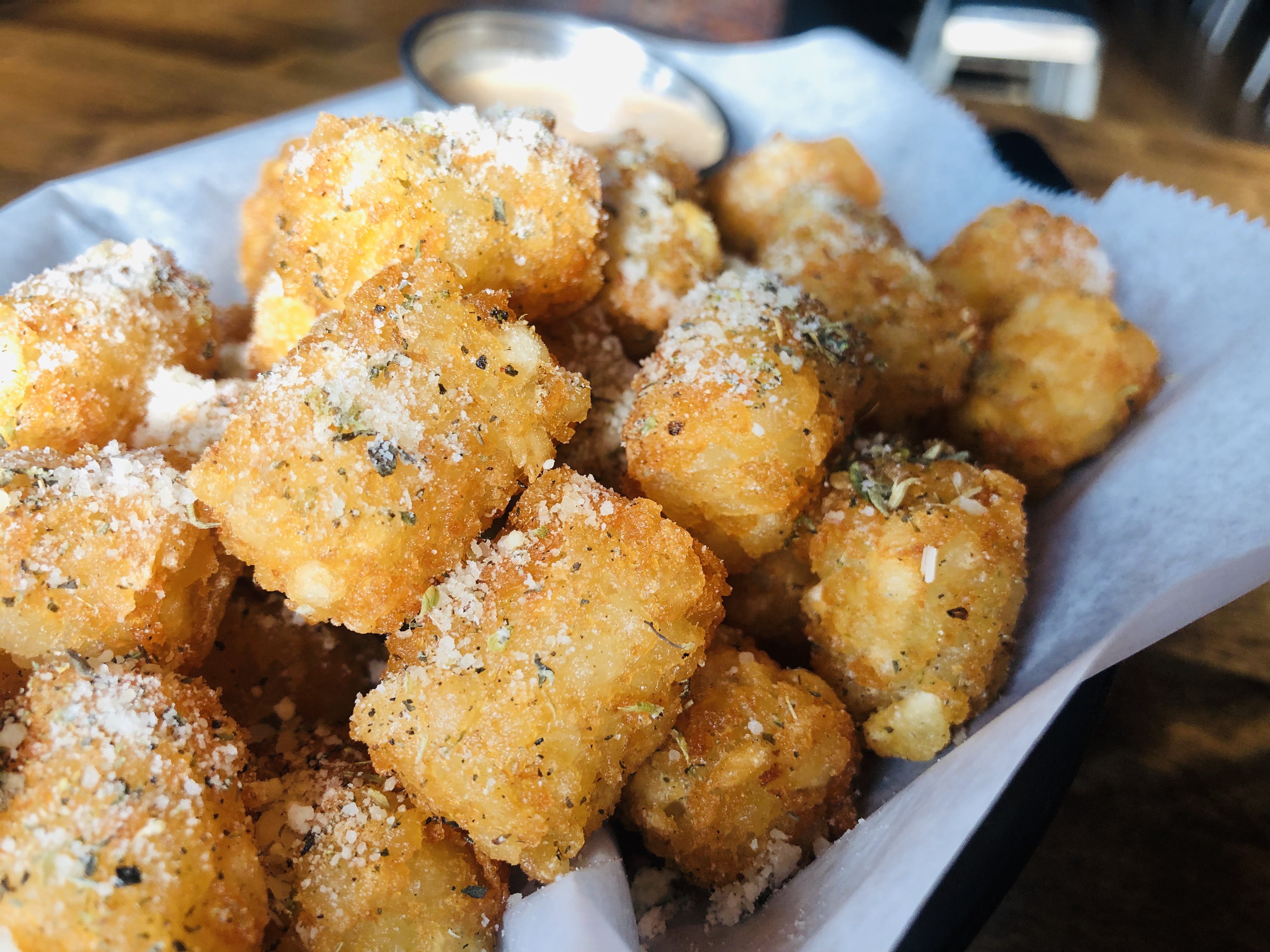 Order Parmesan and Herbs Tots food online from Nola Bar & Kitchen store, Chicago on bringmethat.com